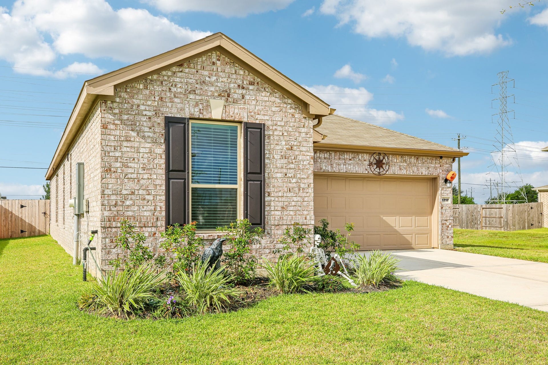 1717 Vista Luna Drive, Texas City, TX 77591 Neutral three-sided brick exterior.