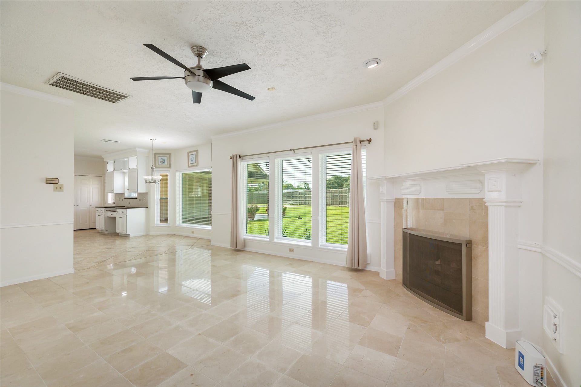 9718 Deverell Drive, Sugar Land, TX 77498 An open layout connects the family room to the kitchen, so conversation flows.