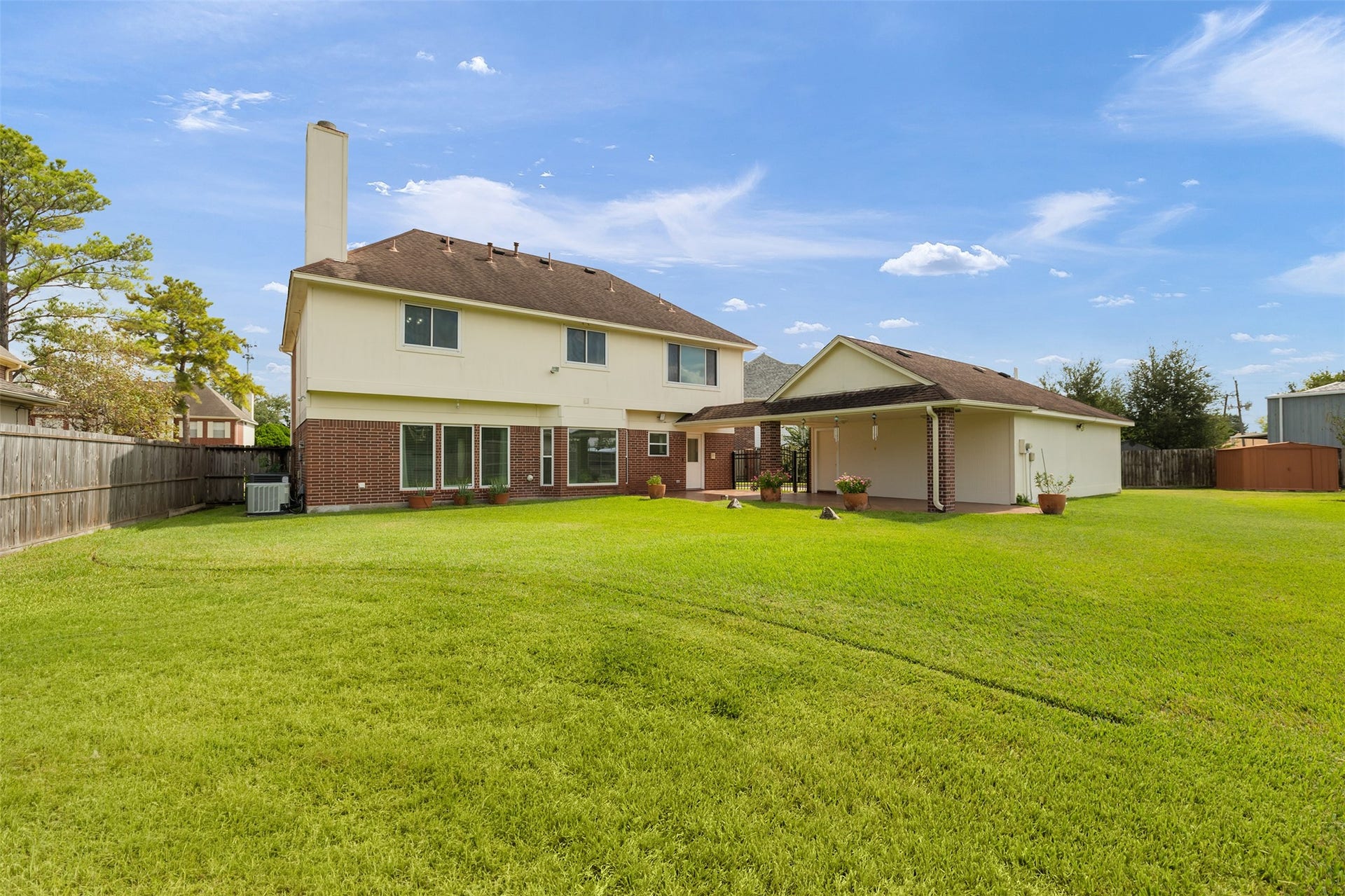 9718 Deverell Drive, Sugar Land, TX 77498 The detached three-car garage offers parking plus extra storage.