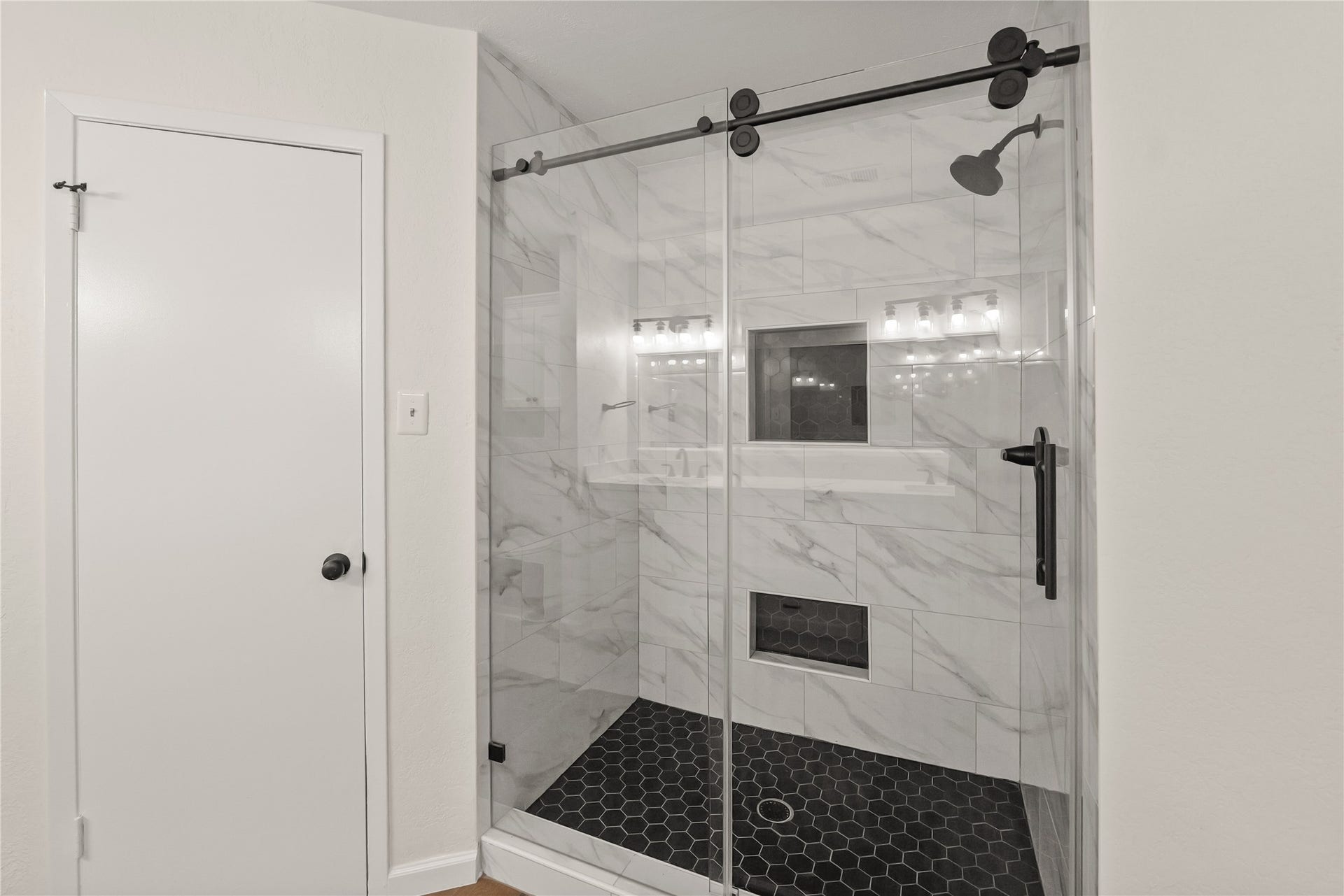 3711 Fern View Drive, Houston, TX 77345 Stunning shower featuring contemporary tile design