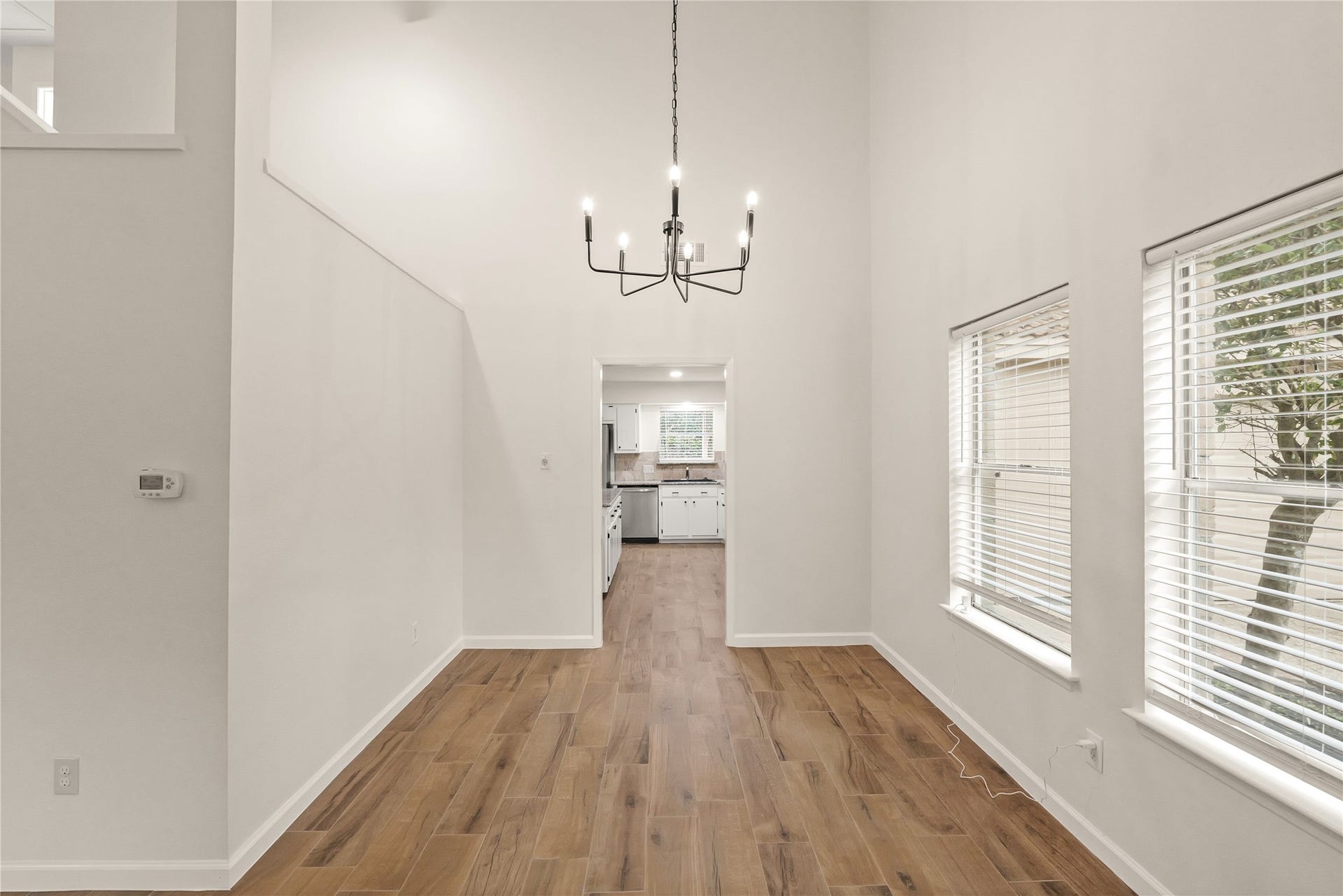 3711 Fern View Drive, Houston, TX 77345 Formal dining area leading to kitchen
