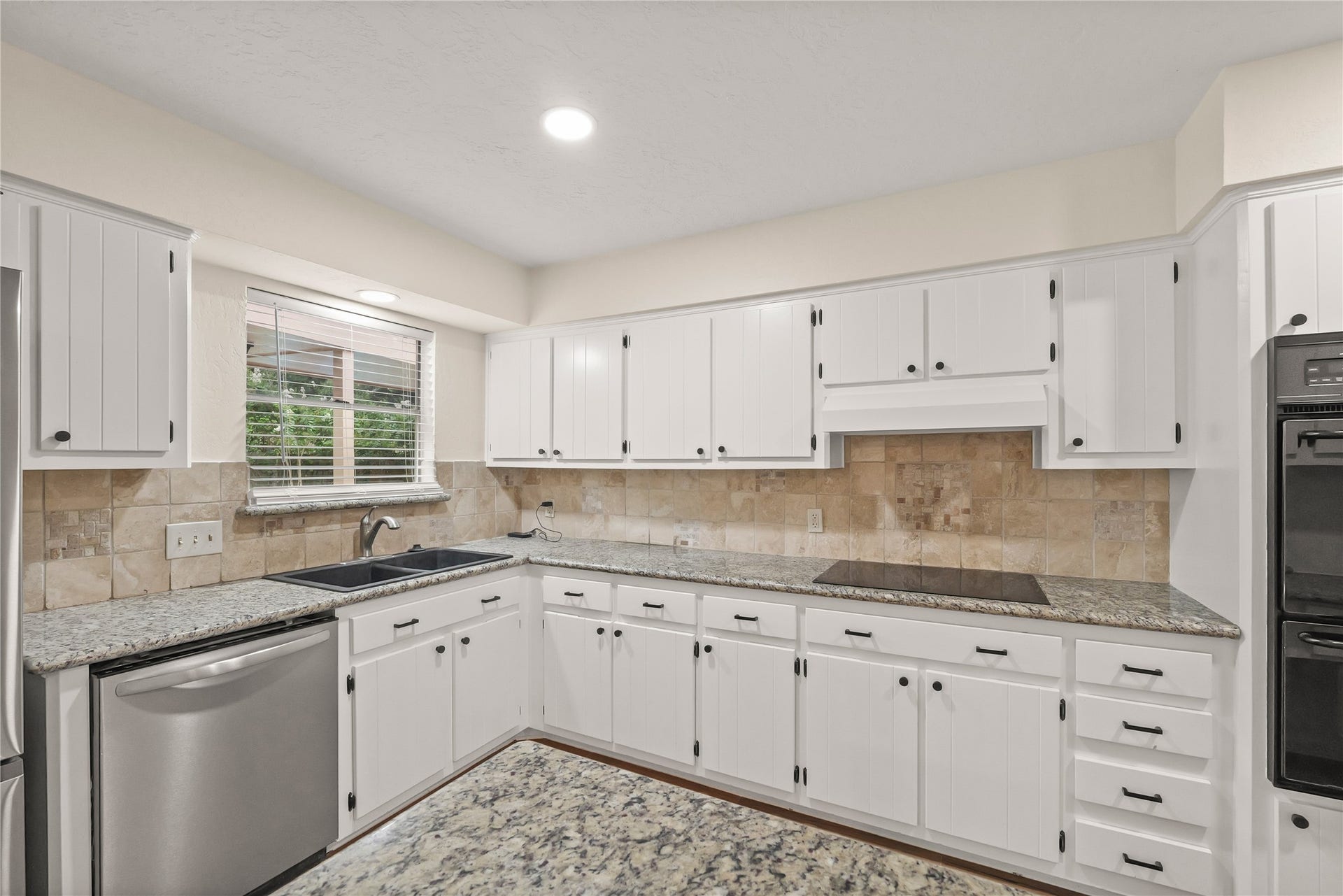 3711 Fern View Drive, Houston, TX 77345 Updated kitchen with ample counterspace and cabinets
