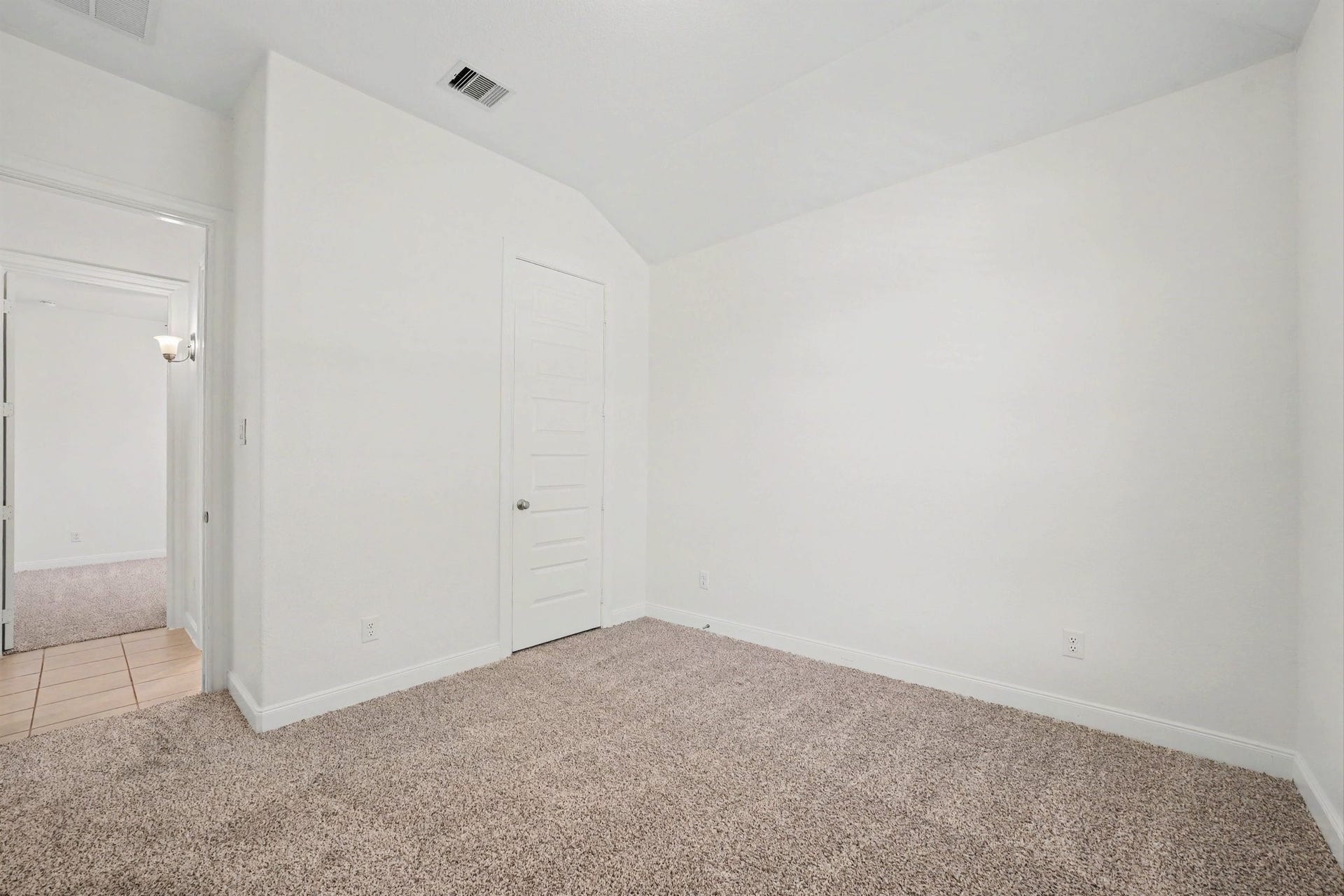 Guest bedroom 2 with newly installed carpet