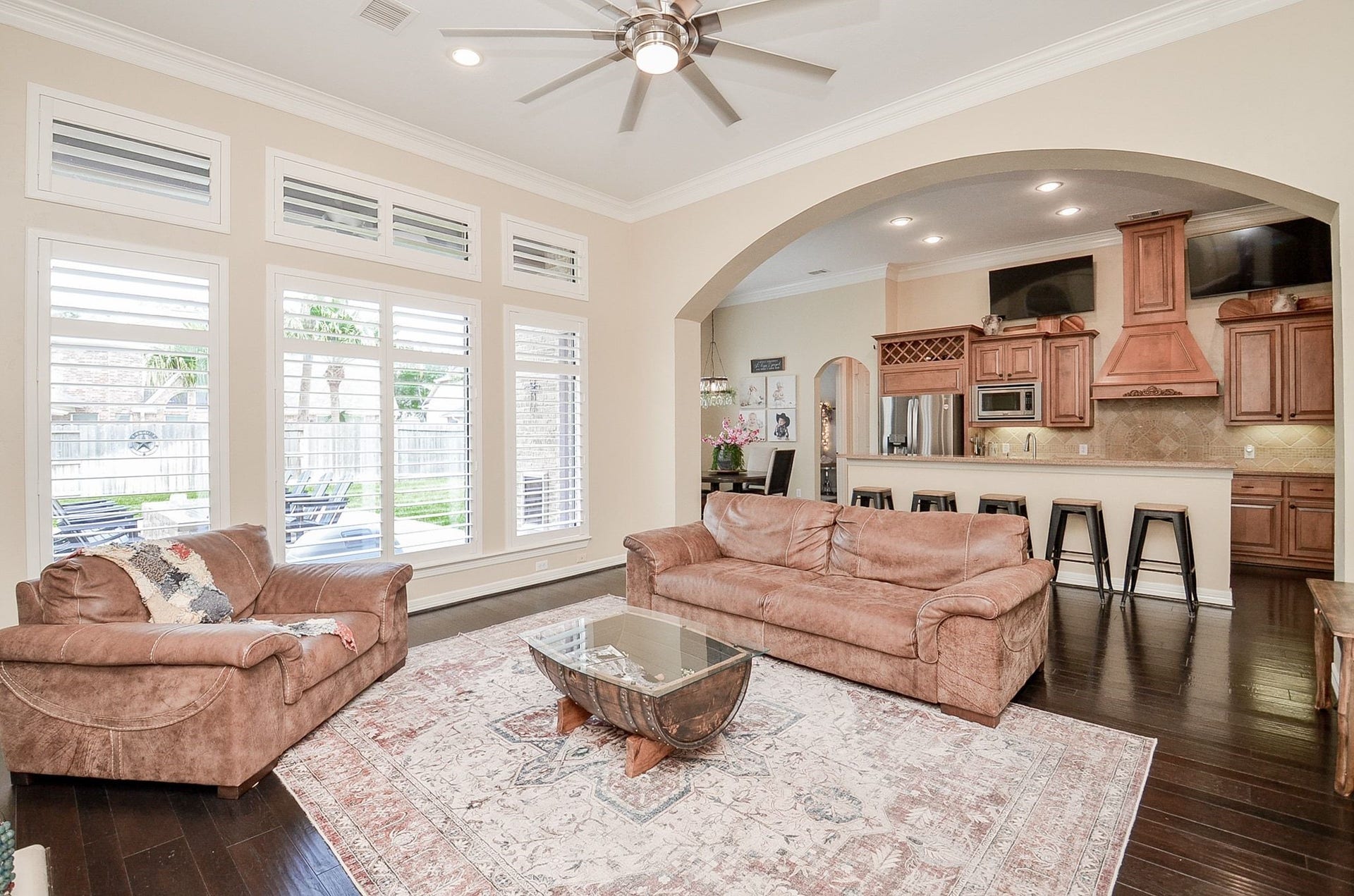 2015 Shadow Bend Drive, Sugar Land, TX 77479 13 foot ceilings, floor to ceiling windows bring in bright natural light. Gorgeous wood shutters add warmth and character.