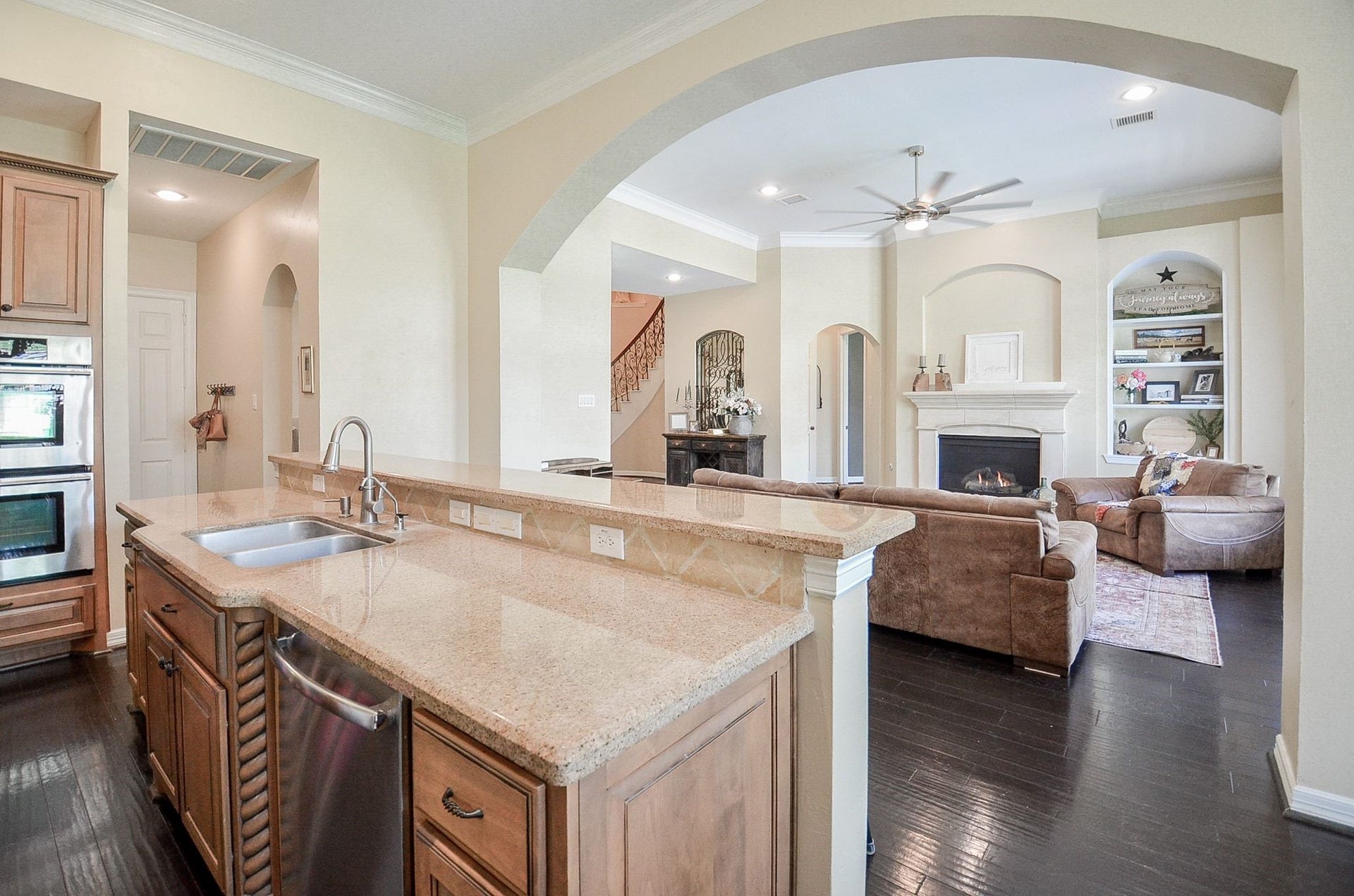 2015 Shadow Bend Drive, Sugar Land, TX 77479 Kitchen is open to family room with updated quartz counter top. Stainless steel sink and updated faucet.