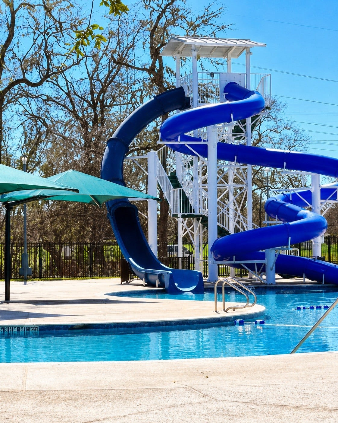 2015 Shadow Bend Drive, Sugar Land, TX 77479 A twisting, spiraling tunnel of fun awaits your family. Greatwood amenities are truly second to none. It's hard to find a community that offers this much right outside your front door. Pools, parks, trails, tennis/pickle ball, recreation and so much more.