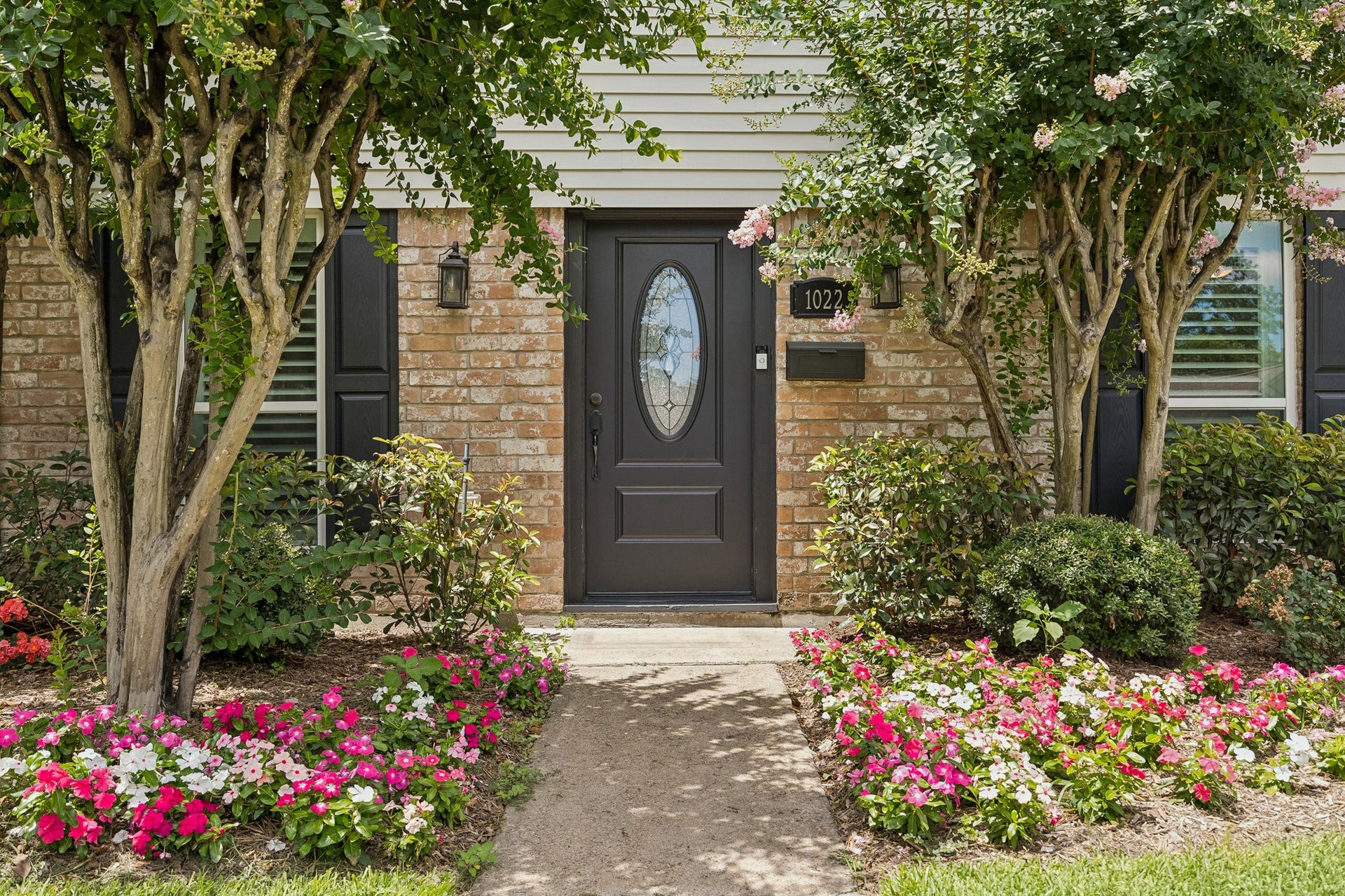 1022 Martin Street, Houston, TX 77018 The lovely entry flanked by bronze lanterns and gorgeous mature crape myrtles.