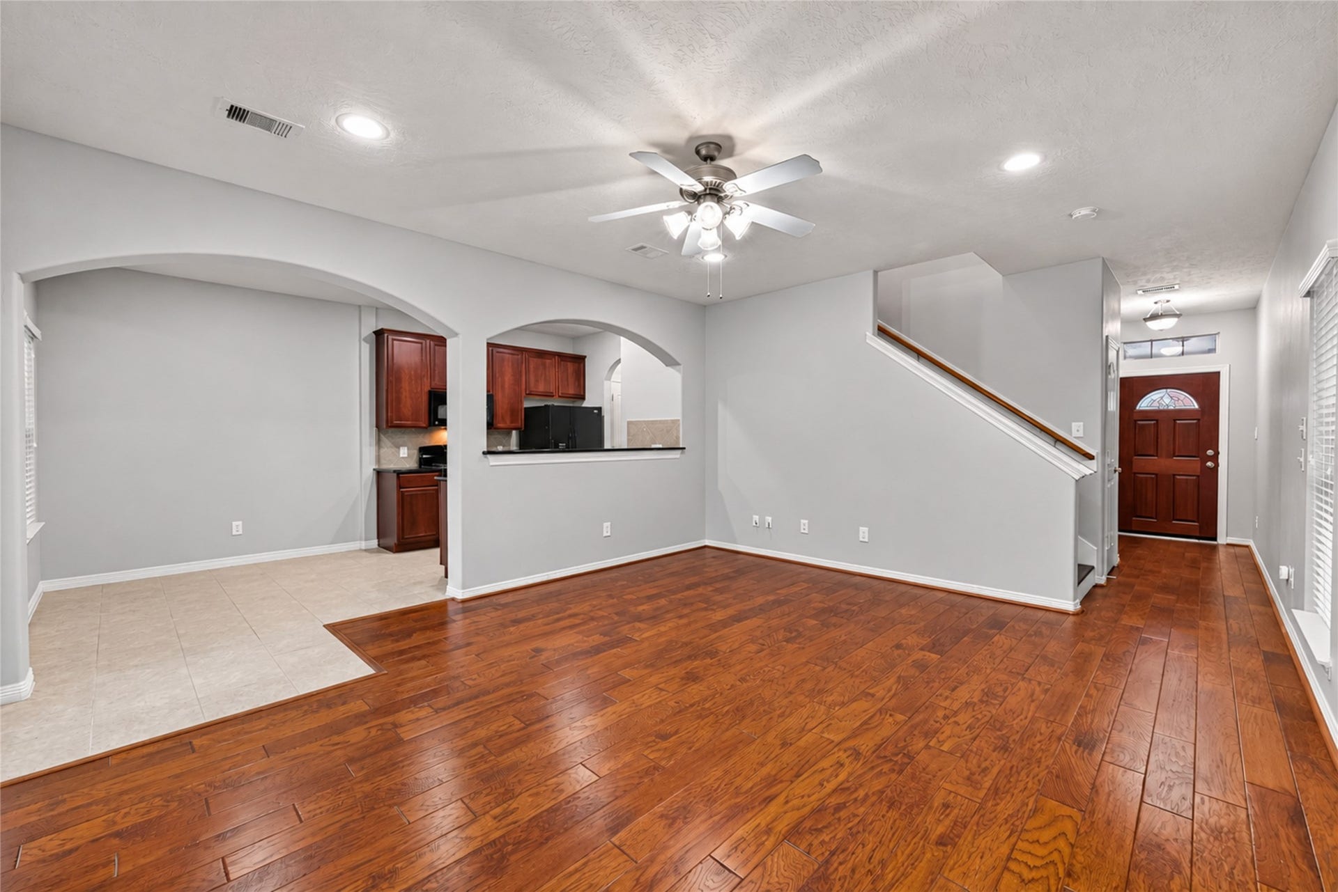 8910 Minola Oaks Drive, Houston, TX 77064 Living room open to kitchen and dining area.
