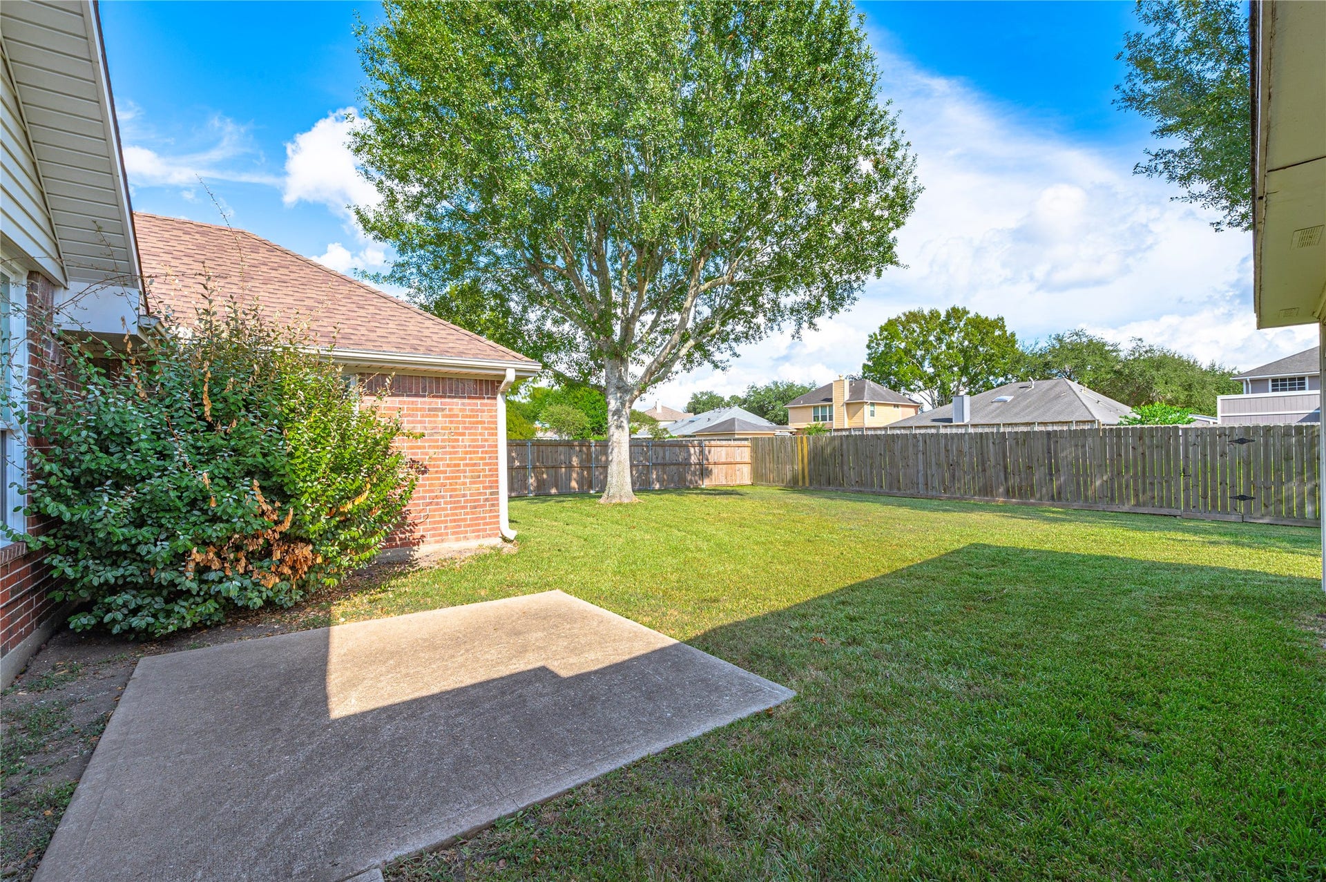 2009 Stapleton Drive, Friendswood, TX 77546 Concrete back patio area overlooks the large backyard. No back neighbors!