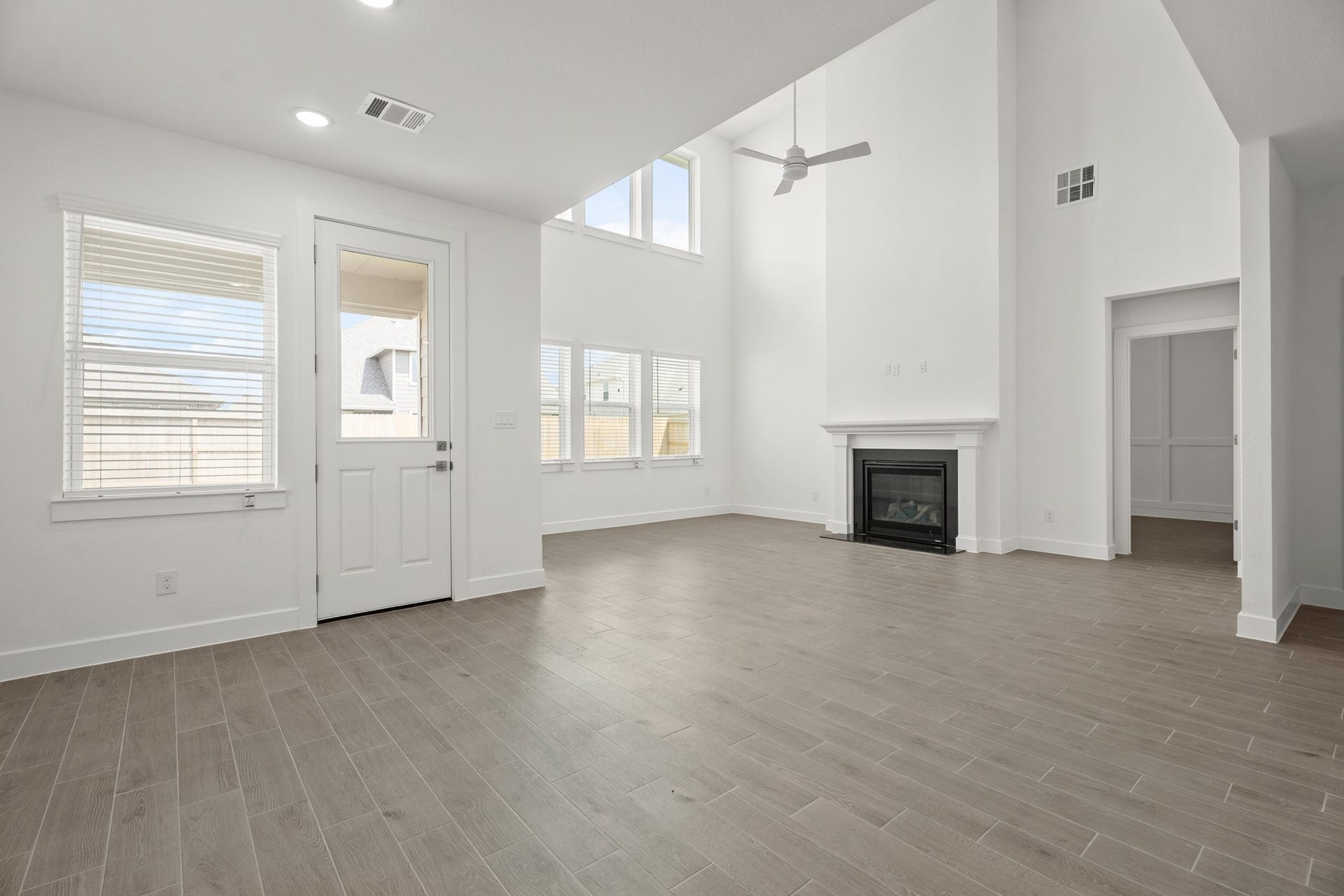 29402 Hillberry Oaks Court, Waller, TX 77484 Open great room and dining area (*Photo not of actual home and used for illustration purposes only.)