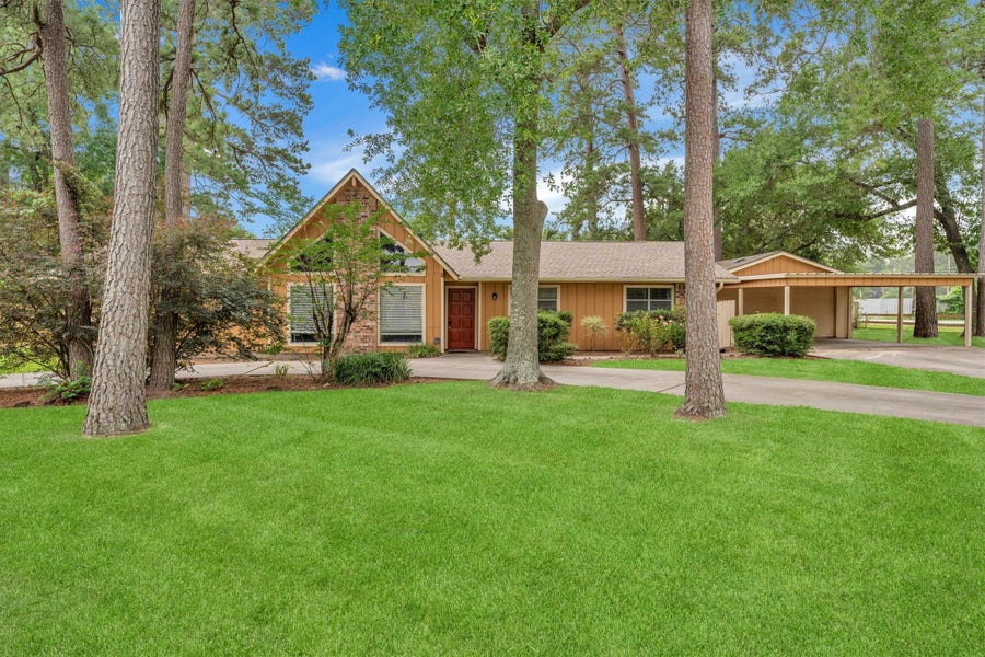Property photo for 12115 Powder Horn Street, Pinehurst, TX