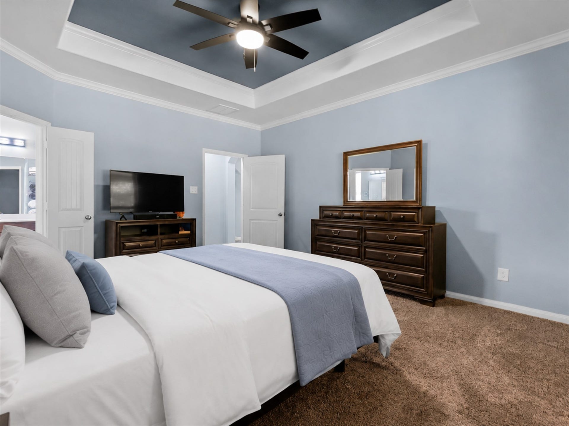 28619 Riverside Crest Lane, Huffman, TX 77336 Another view of the primary bedroom highlights the generous space and comfortable, calming atmosphere.
