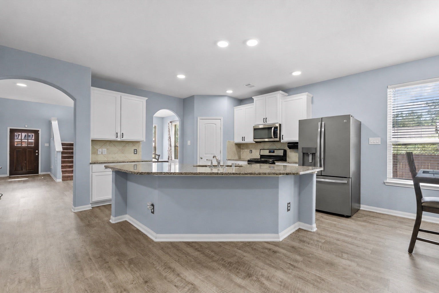 28619 Riverside Crest Lane, Huffman, TX 77336 Step inside to a bright, open-concept kitchen designed for everyday living and easy entertaining.