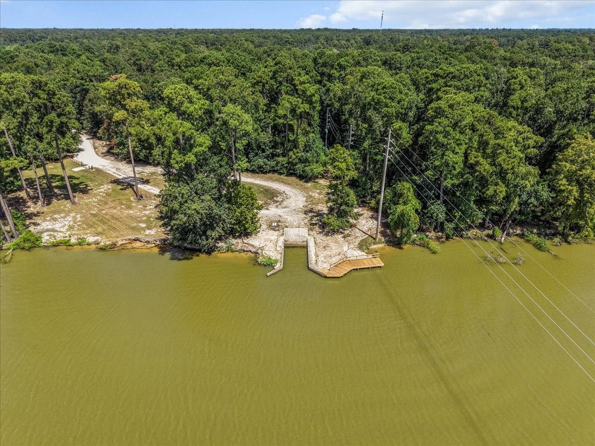 28619 Riverside Crest Lane, Huffman, TX 77336 The Commons lifestyle includes nearby Lake Houston access with a community boat launch for days on the water.