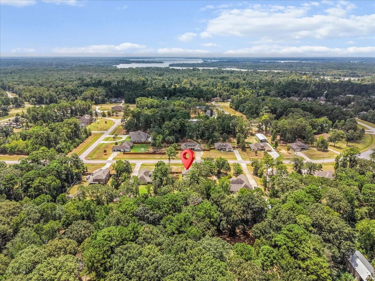 28619 Riverside Crest Lane, Huffman, TX 77336 From above, you can appreciate the beautiful wooded surroundings and peaceful setting The Commons is known for.