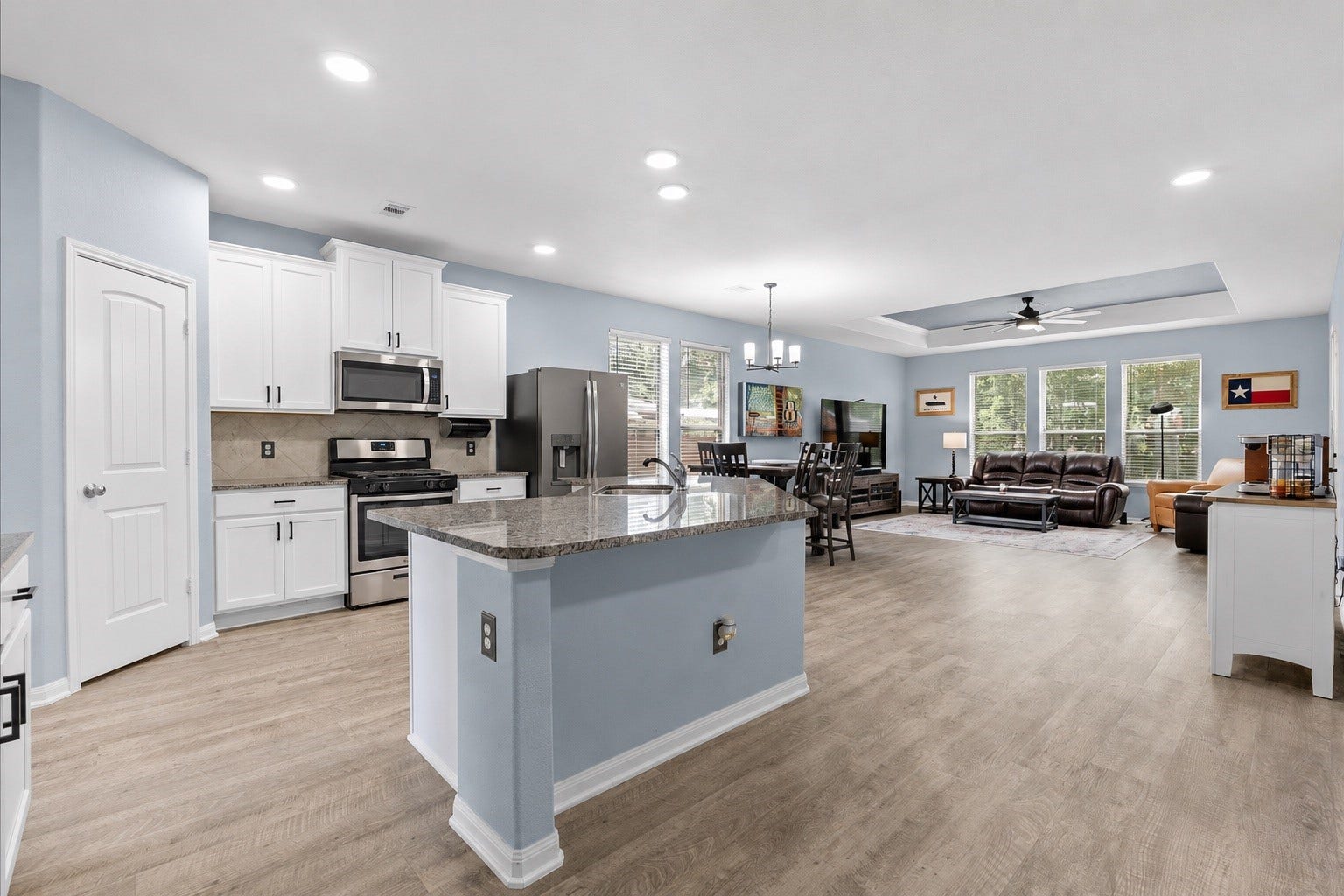 28619 Riverside Crest Lane, Huffman, TX 77336 The spacious kitchen flows effortlessly into the dining and living areas, keeping everyone connected.