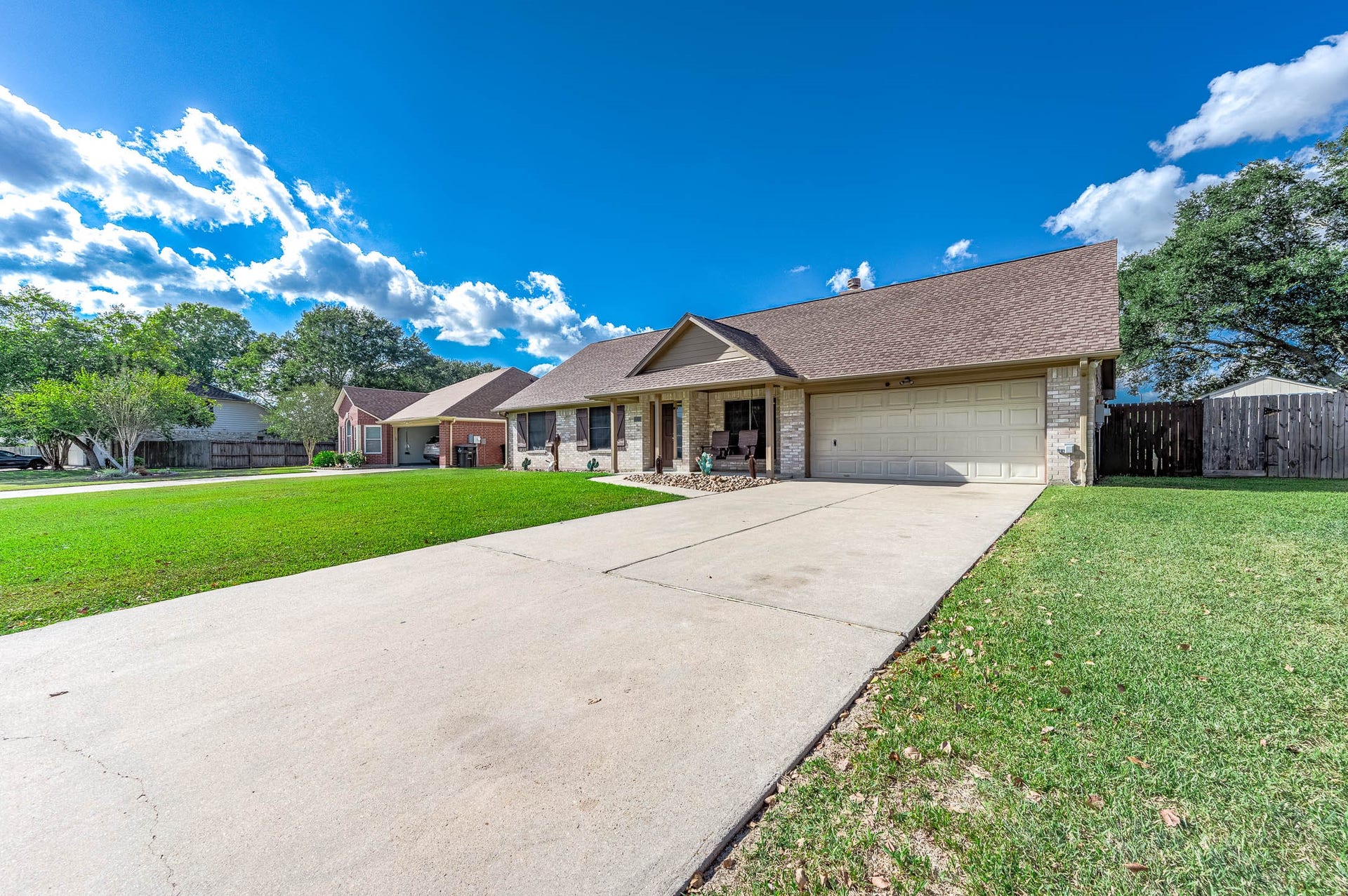 Double wide driveway...PLUS...NEW ROOF IN 2025!