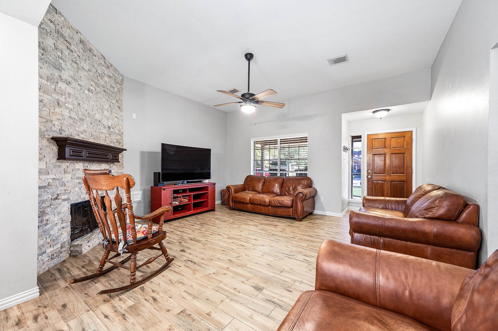 High ceilings and front window overlooking front of home