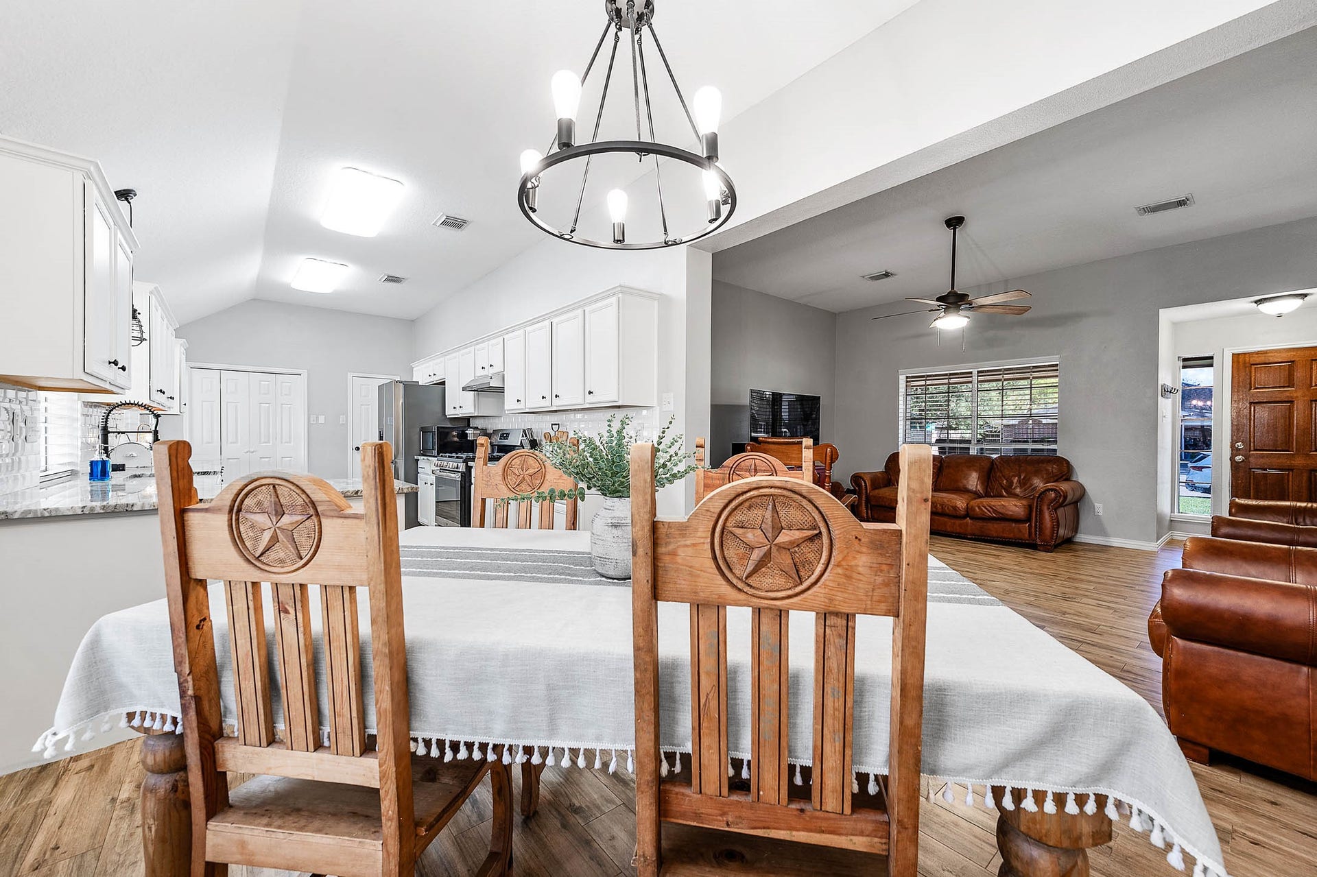 Kitchen, dining and family room areas a great place for food, family and fun