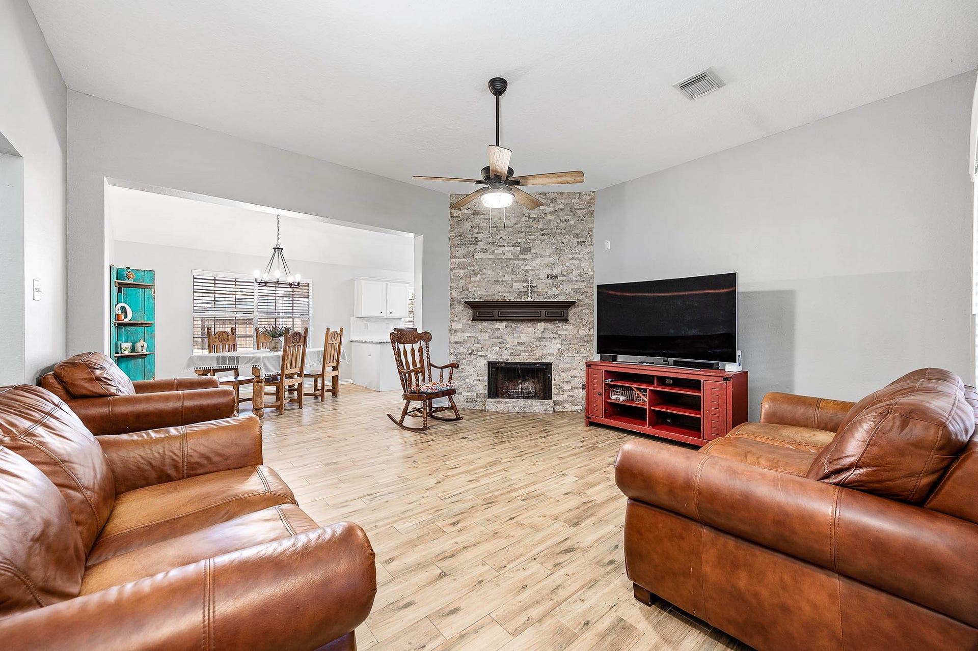 The hub of the home, beautiful stone fireplace, is the perfect centerpiece for family gatherings