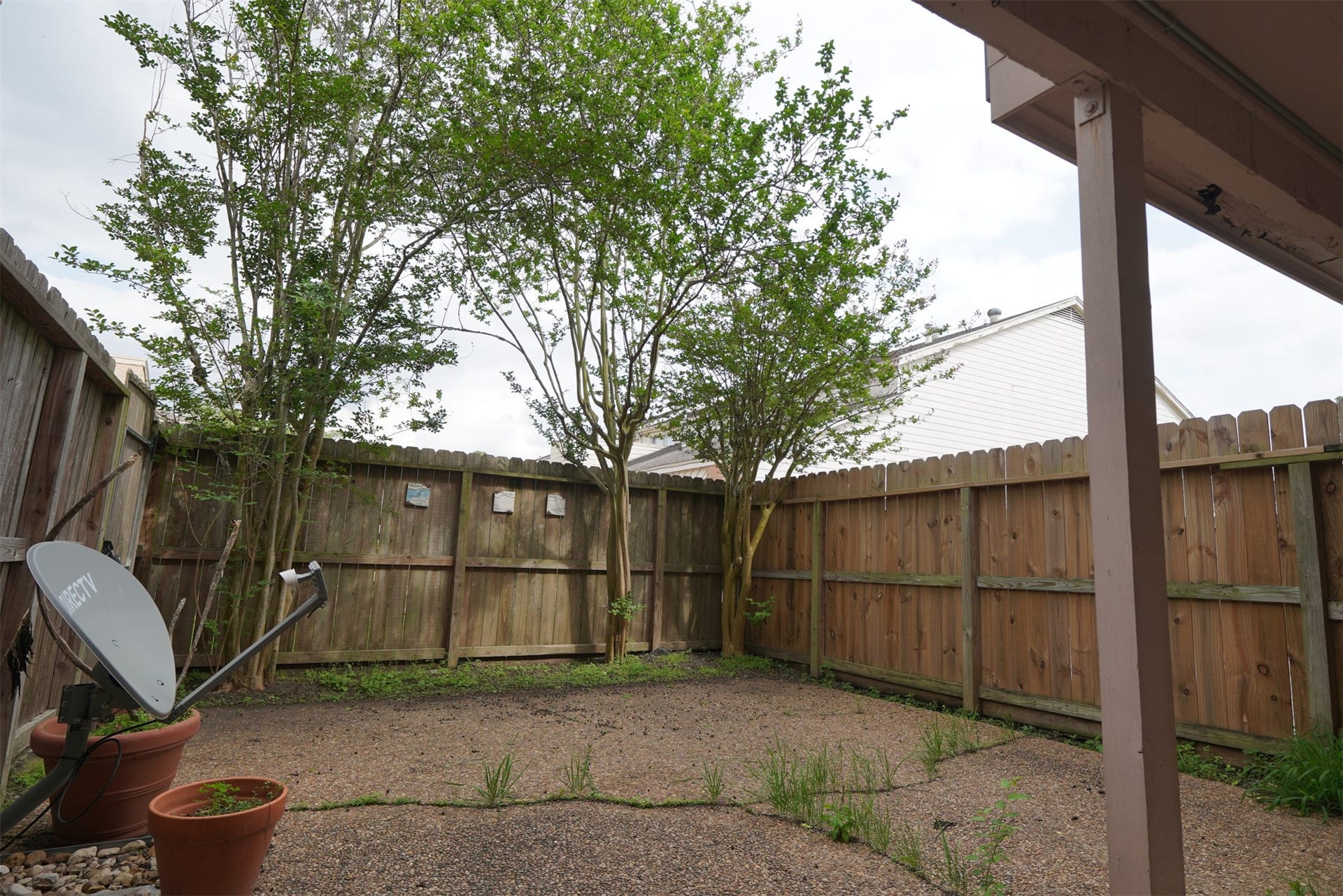 12633 Memorial Drive, #77, Houston, TX 77024 Large background space with crepe myrtles