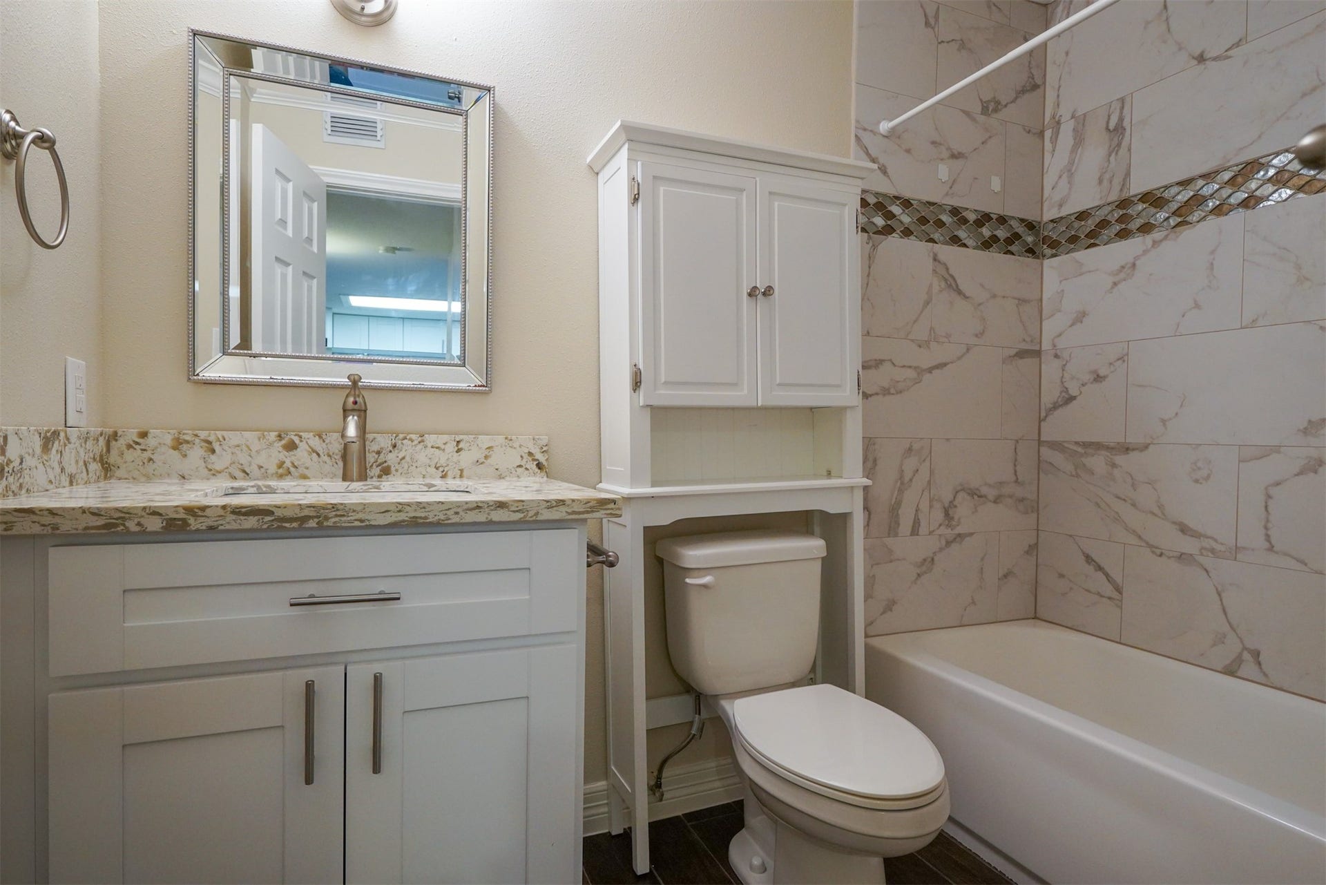 12633 Memorial Drive, #77, Houston, TX 77024 Like new bathroom with tiles,accents, tall cabinet and granite