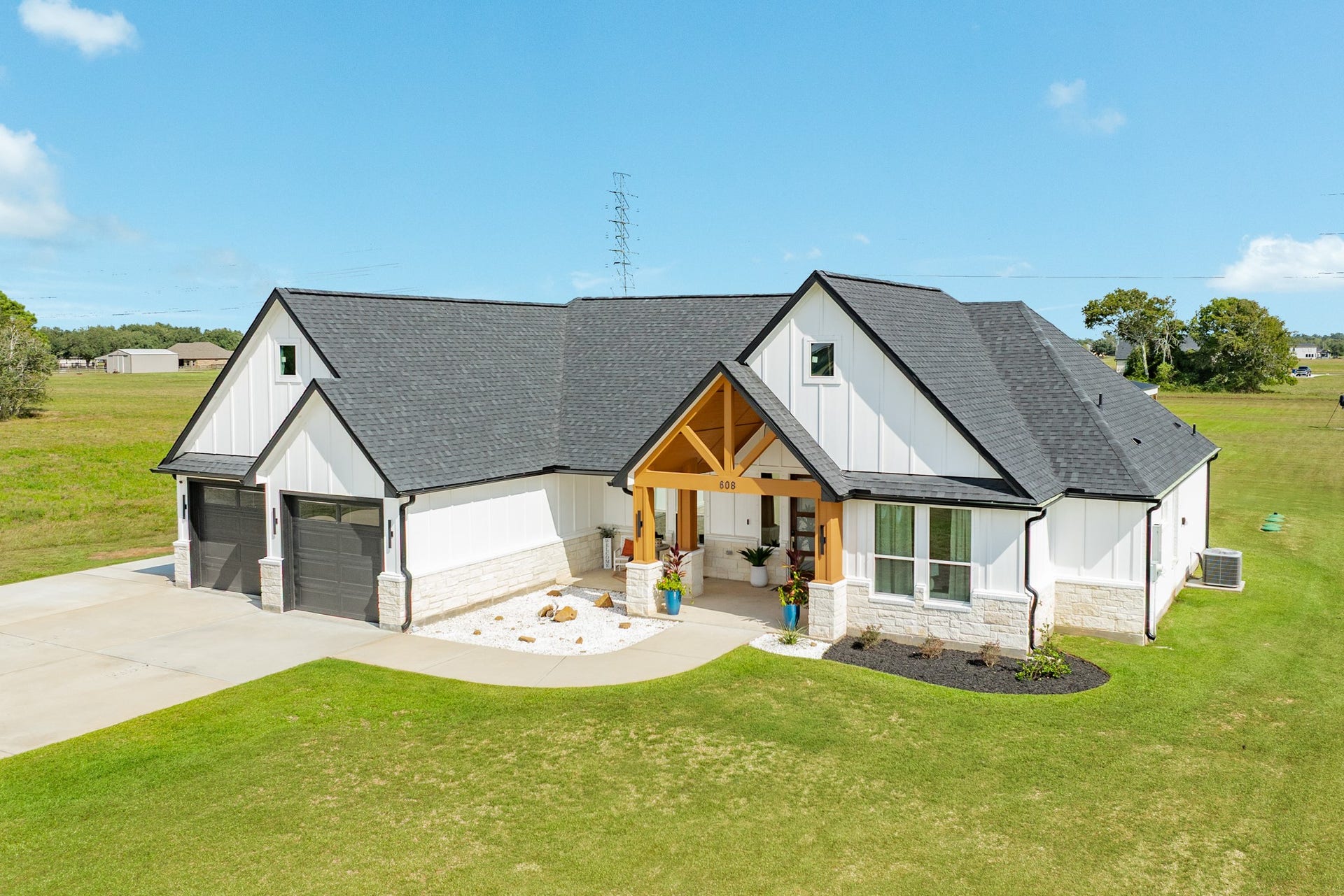 608 Angus Trail, Angleton, TX 77515 Homes features whole home gutters