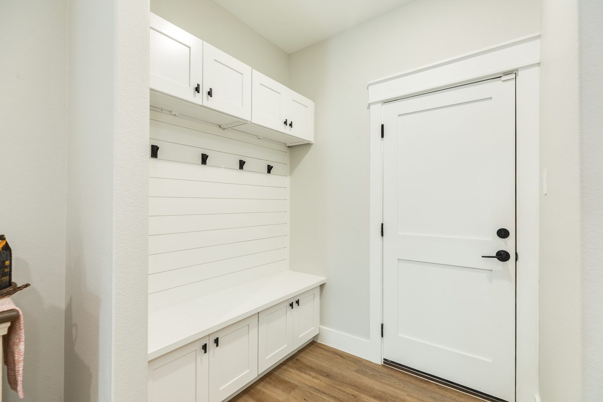 608 Angus Trail, Angleton, TX 77515 Charming mudroom with built-in storage and a convenient bench, perfect for organizing outerwear, shoes, backpacks, etc., for organization