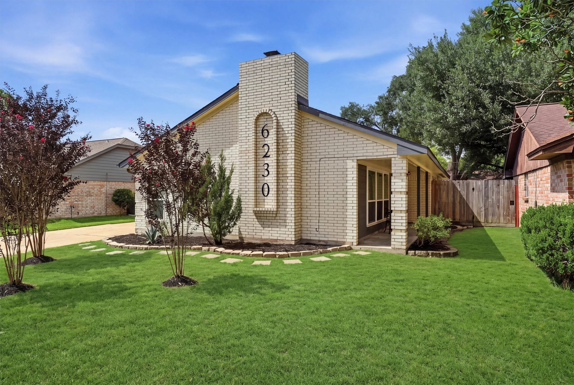 6230 Autumn Arbor Drive, Houston, TX 77092 Beautiful front elevation. Grass is digitally staged.