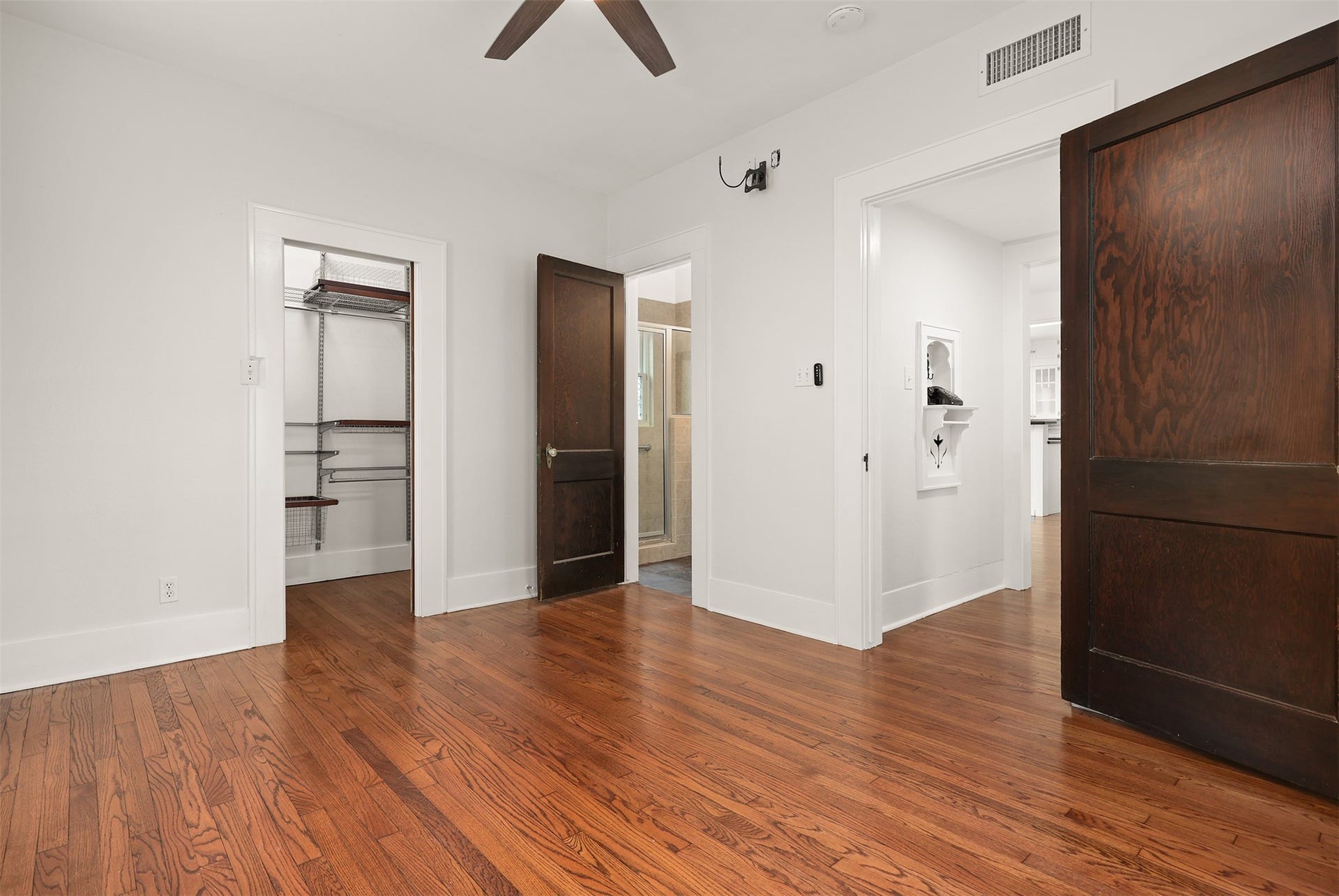4323 Sherman Boulevard, Galveston, TX 77550 Versatile walk in closet with shelving you can customize.