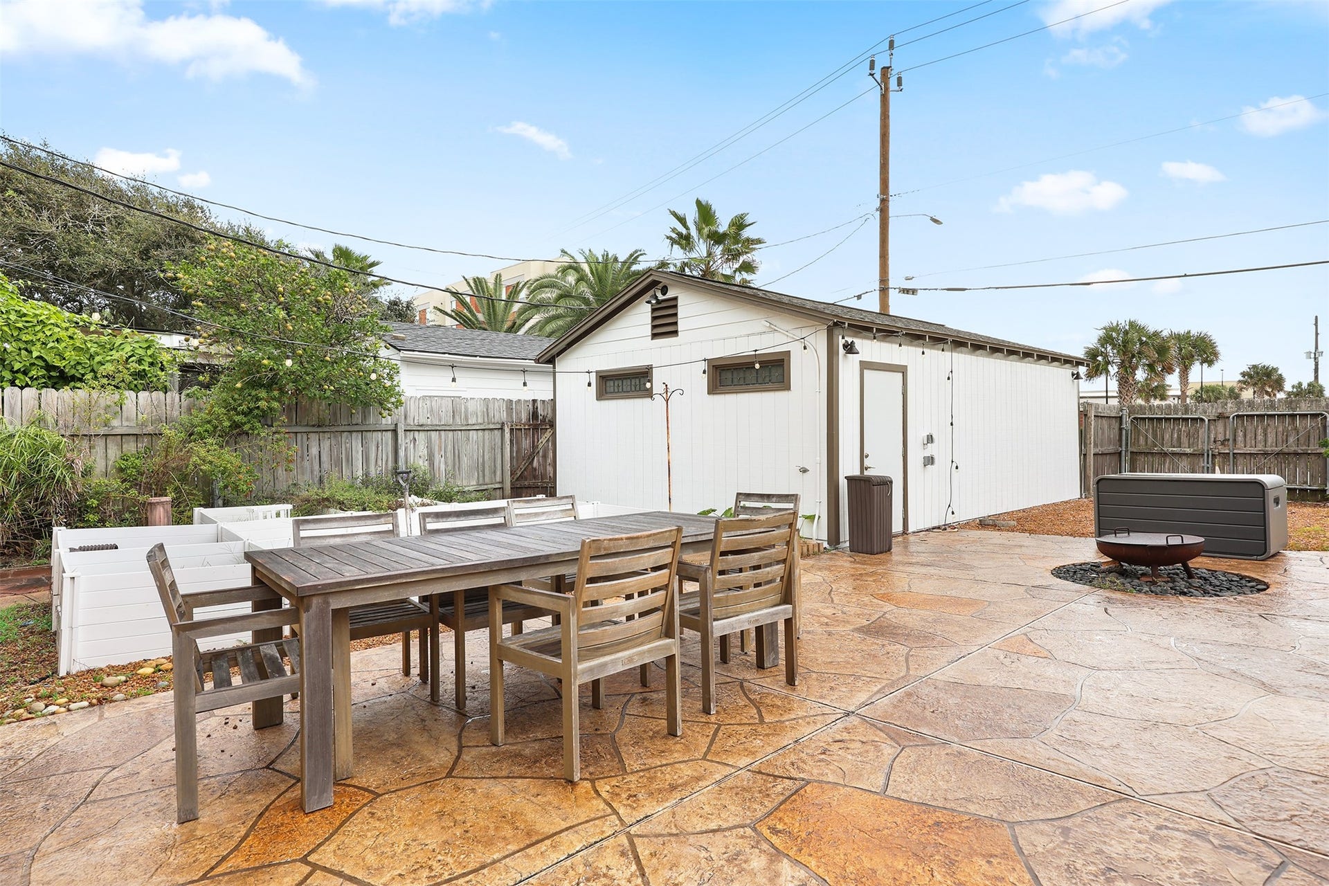 4323 Sherman Boulevard, Galveston, TX 77550 Spacious backyard patio with room for a dining area and fire pit.