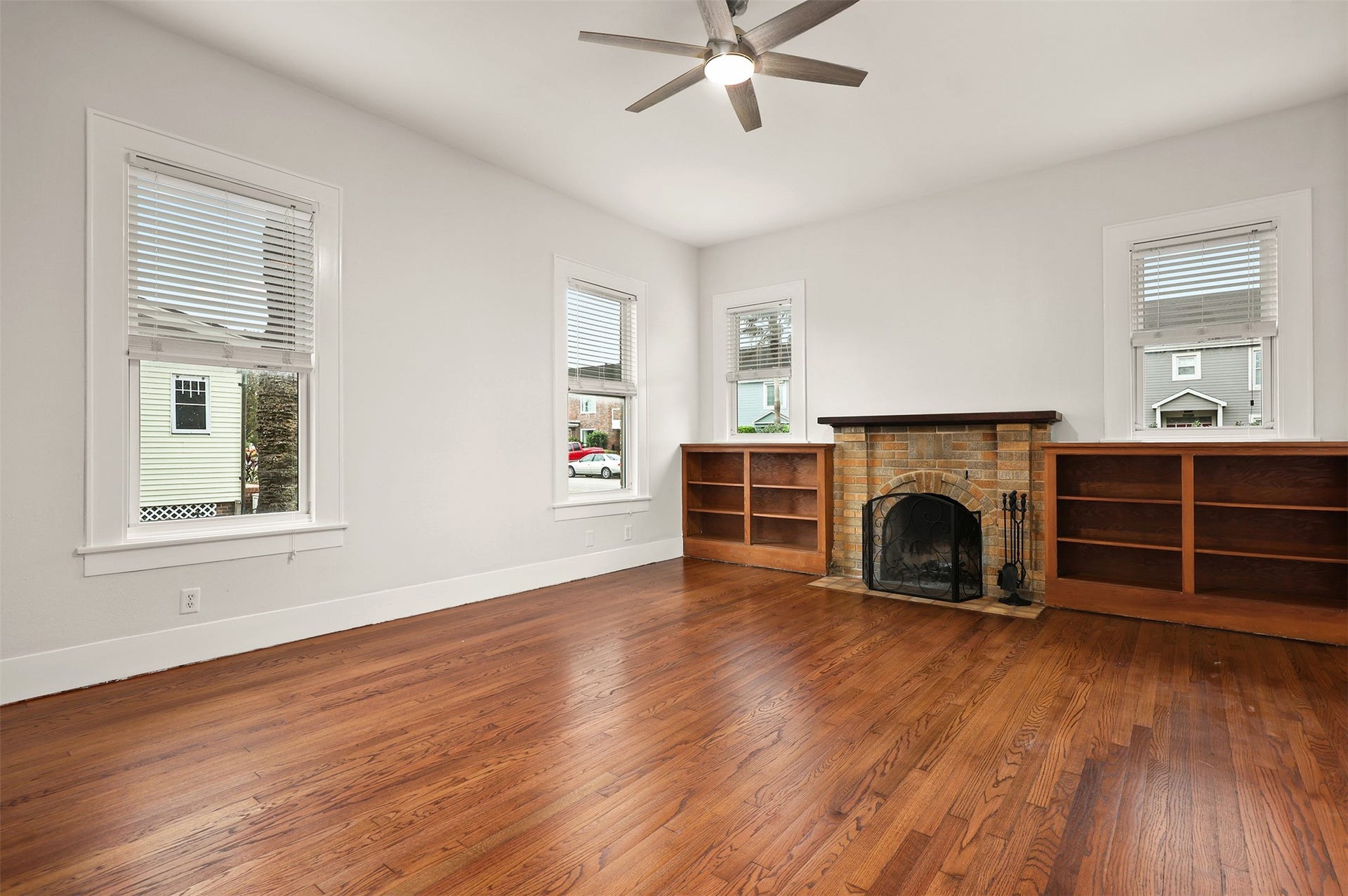 4323 Sherman Boulevard, Galveston, TX 77550 Abundant natural light from the large windows with rich hardwood floors.