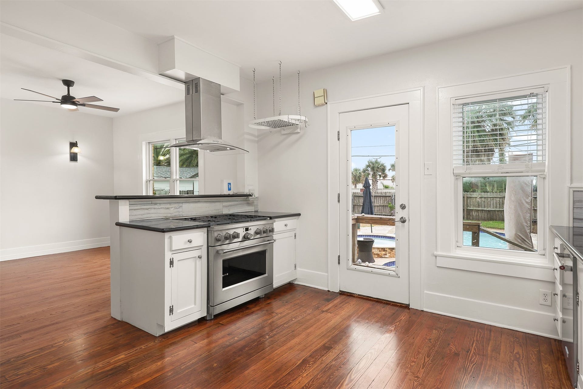 4323 Sherman Boulevard, Galveston, TX 77550 Easy access through the back door to backyard pool.