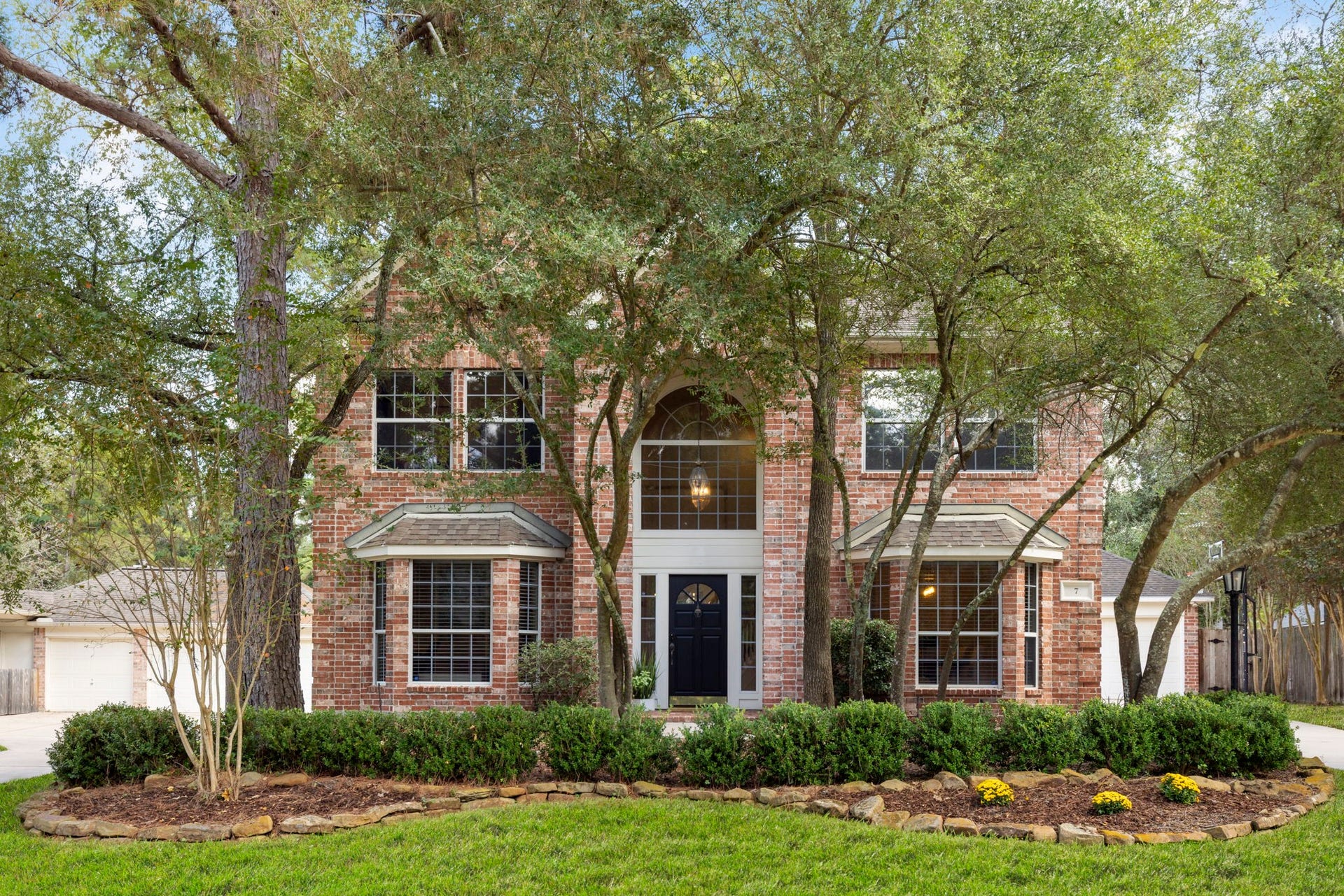 7 S Acacia Park Circle, The Woodlands, TX 77382 Sod in some photos is virtually enhanced.