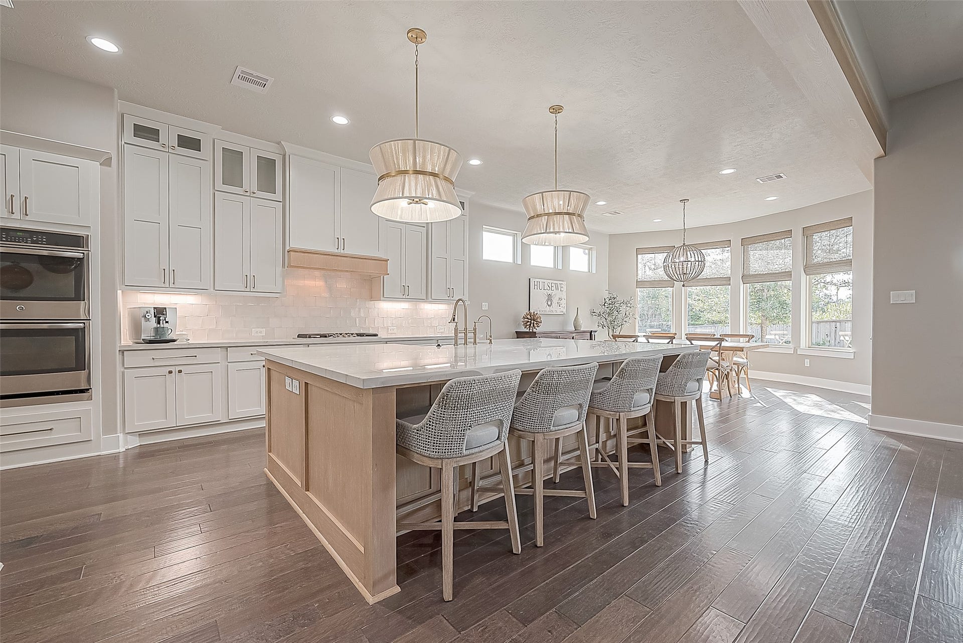 30 Argosy Bend Place, Tomball, TX 77375 The large island offers additional seating and conversation with the one who is cooking the meals.