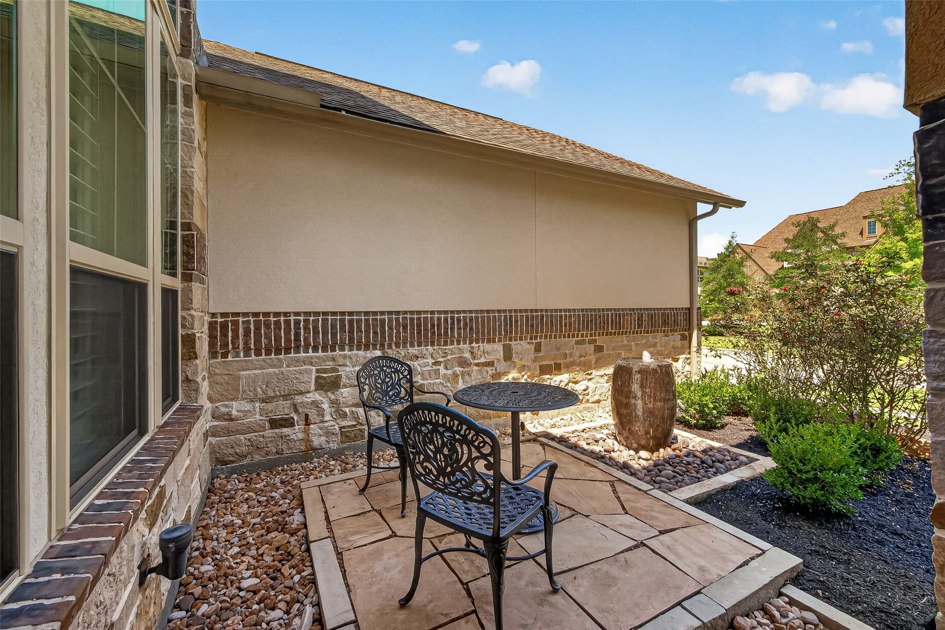 30 Argosy Bend Place, Tomball, TX 77375 Water feature at the front door with area for seating
