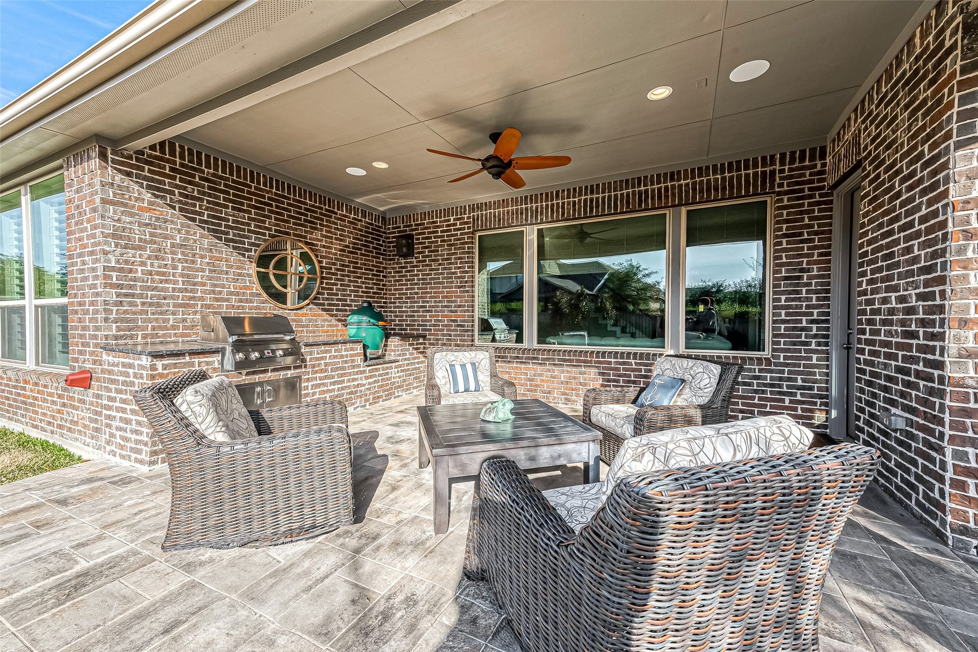 30 Argosy Bend Place, Tomball, TX 77375 Extended patio has room for morning coffee or nightly wine.