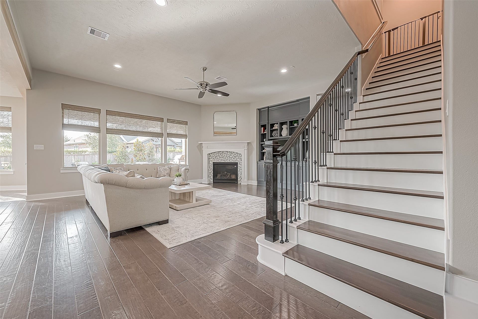 30 Argosy Bend Place, Tomball, TX 77375 A view into the open living area - the stairs take you to the flex/game room and a half bath.