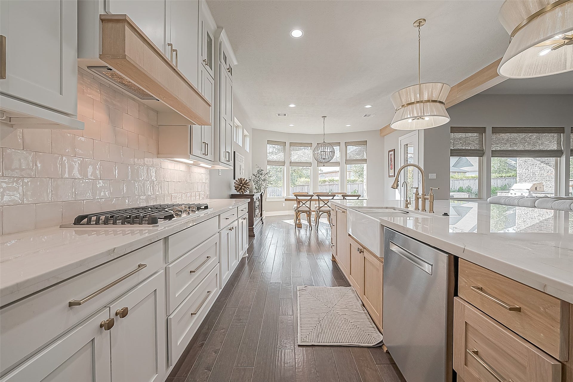 30 Argosy Bend Place, Tomball, TX 77375 Rich wood and gold accents enhance the contemporary farmhouse aesthetic.