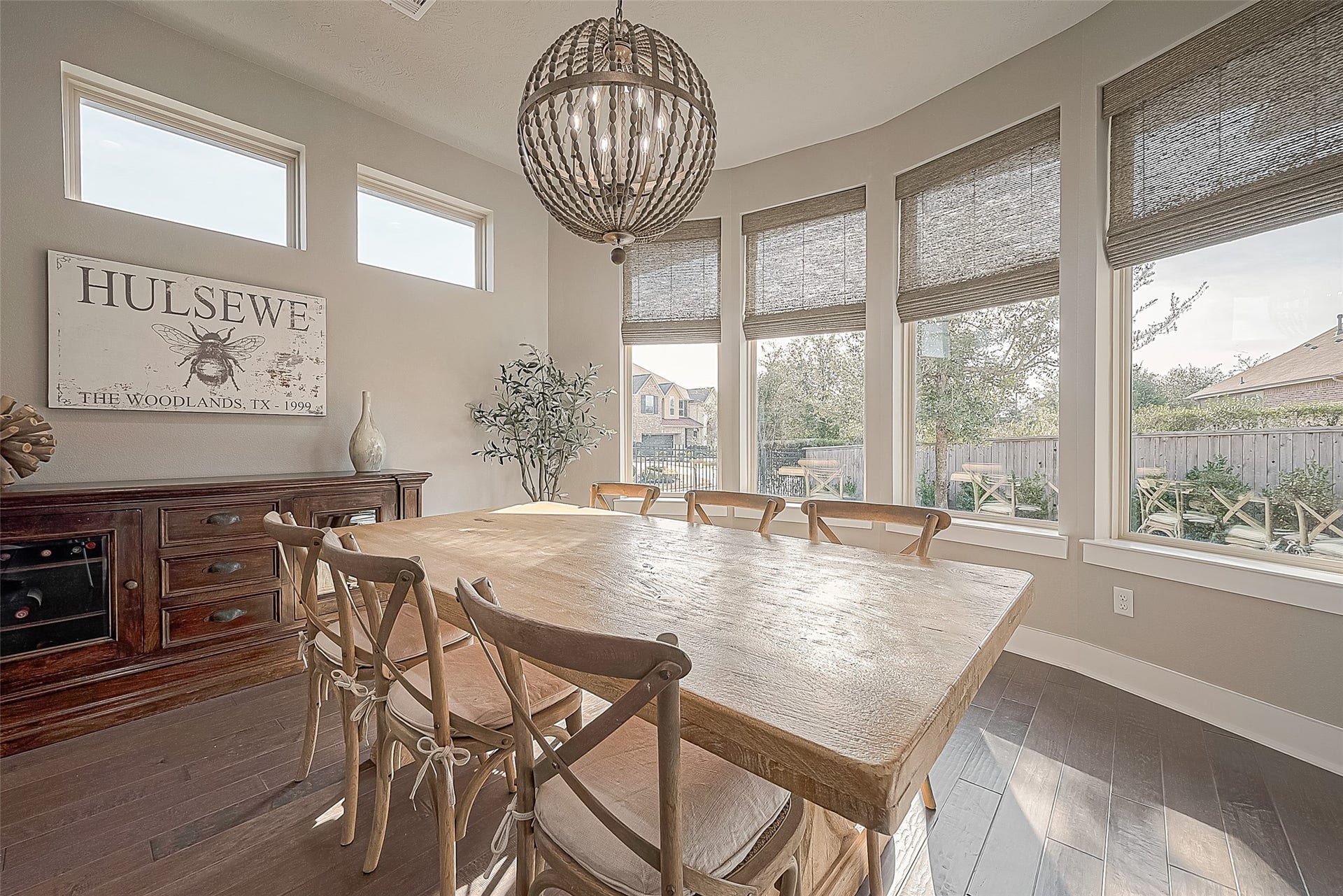 30 Argosy Bend Place, Tomball, TX 77375 The dining area is bathed in natural light and provides ample space for large gatherings to comfortably sit and enjoy meals.