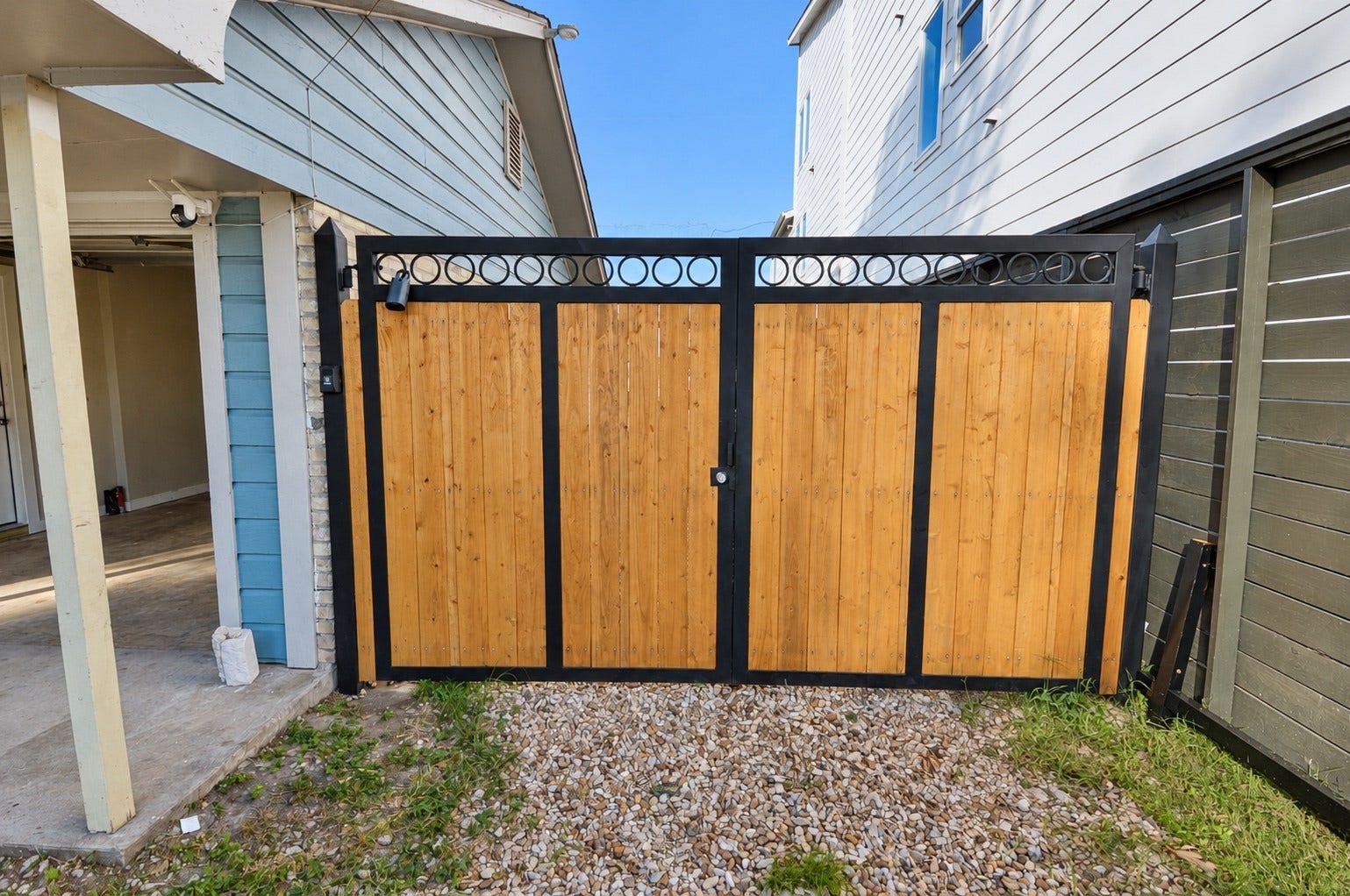 1837 Wycliffe Drive, Houston, TX 77043 Gated entry to backyard and detached garage.
