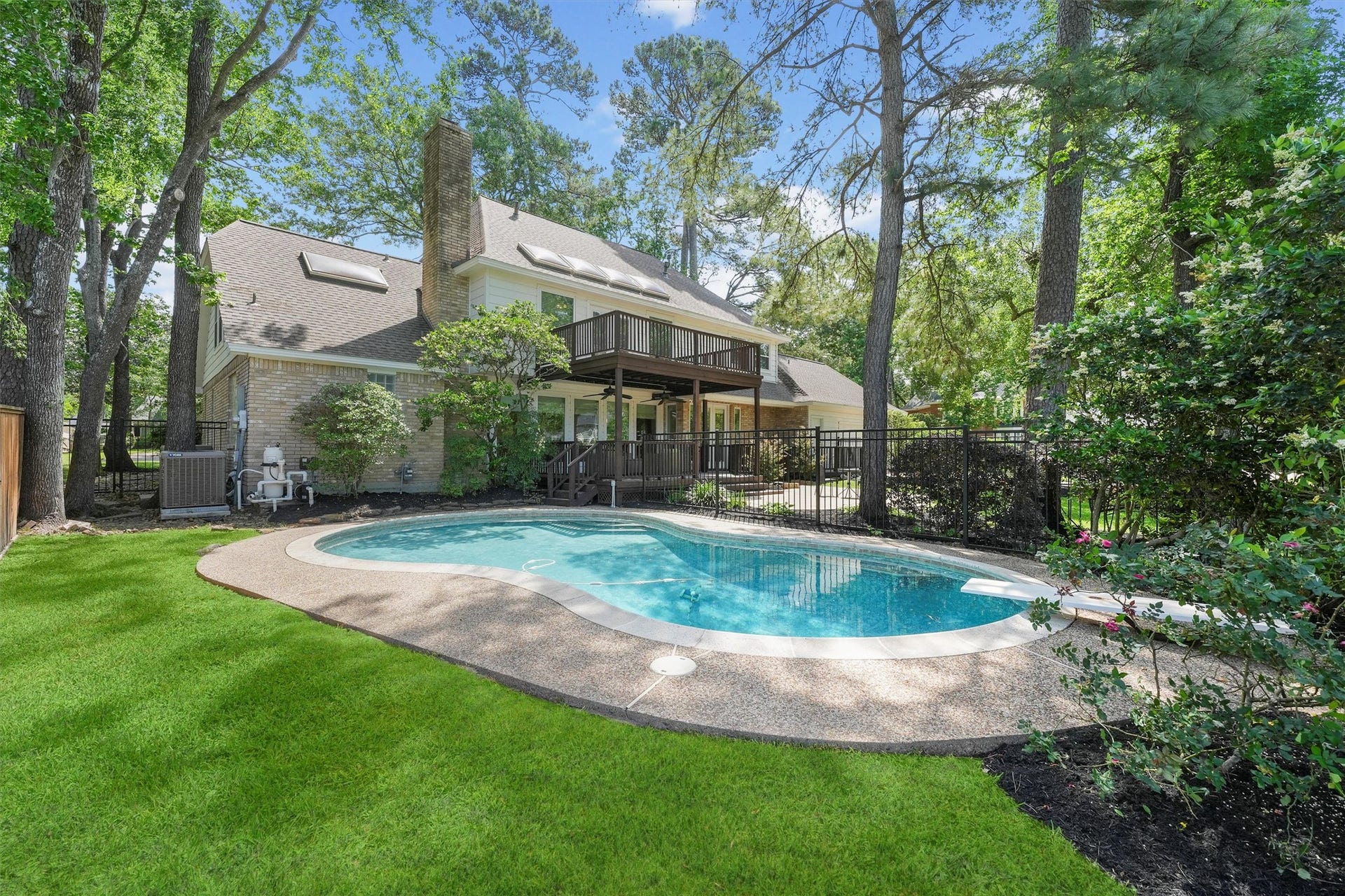2023 Forest Garden Drive, Kingwood, TX 77345 Another view of the pool and this lovely home!