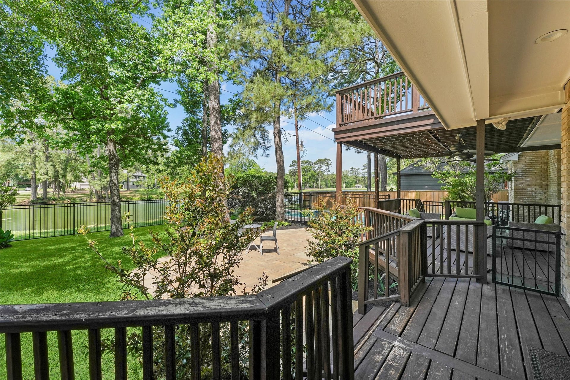 2023 Forest Garden Drive, Kingwood, TX 77345 From the breakfast room step out to the deck and backyard.