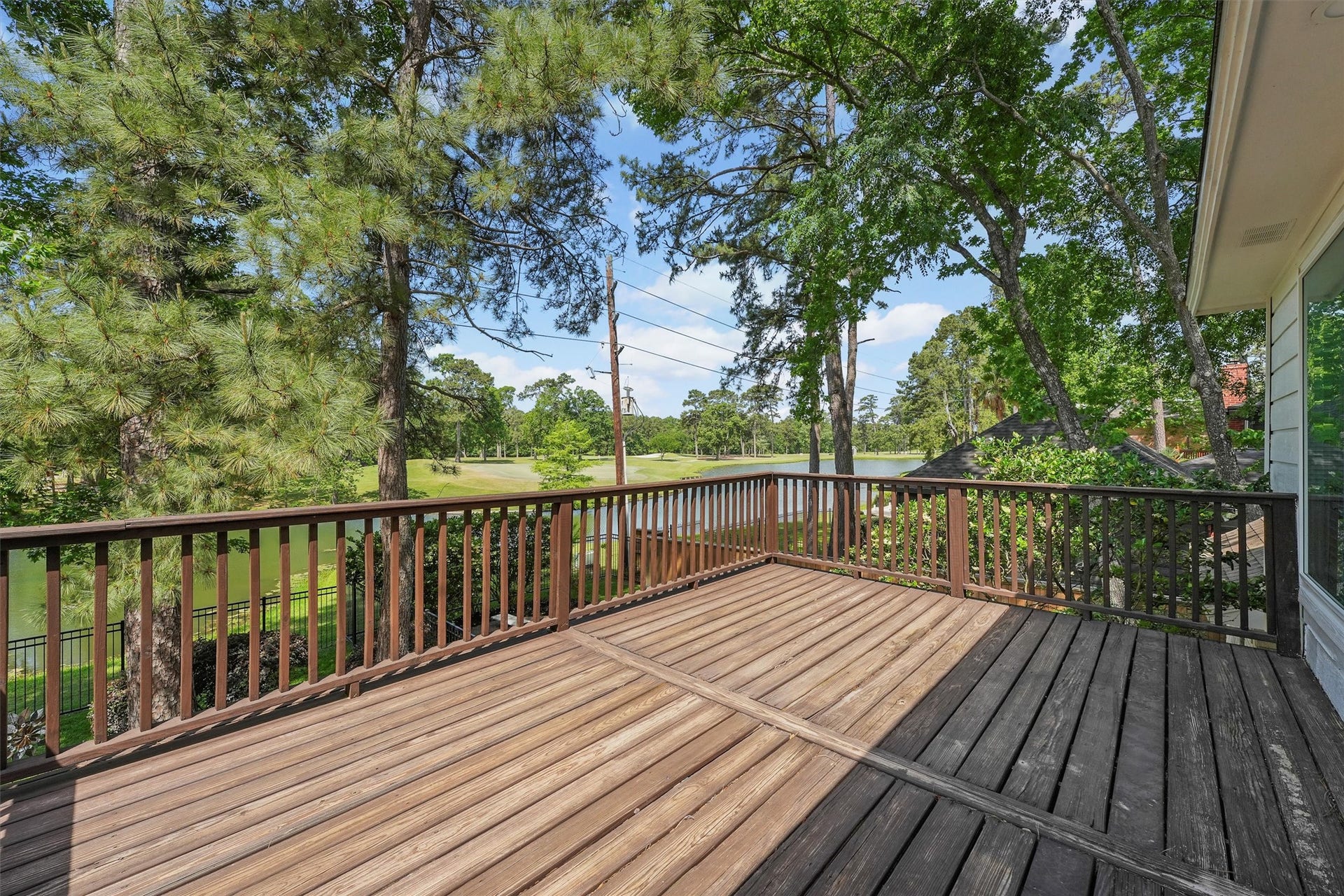 2023 Forest Garden Drive, Kingwood, TX 77345 Step outside to the second floor balcony and these beautiful views!