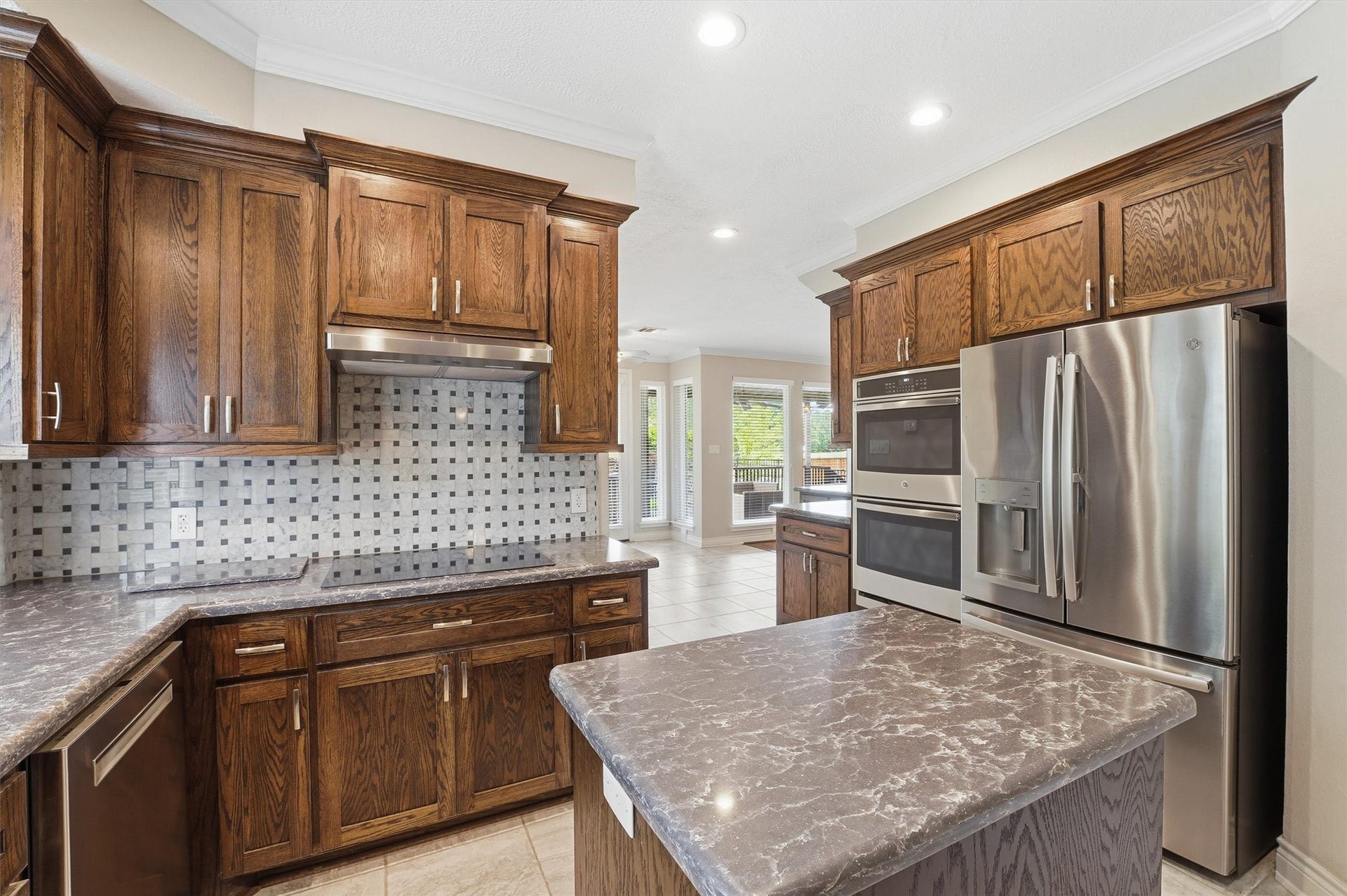 2023 Forest Garden Drive, Kingwood, TX 77345 Functional kitchen with generous counter space and storage, designed for daily use and hosting