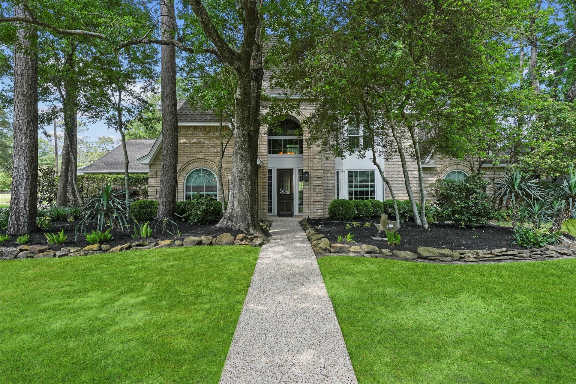 2023 Forest Garden Drive, Kingwood, TX 77345 Located in Kingwood, this home offers a welcoming setting with mature landscaping and a quiet neighborhood feel.