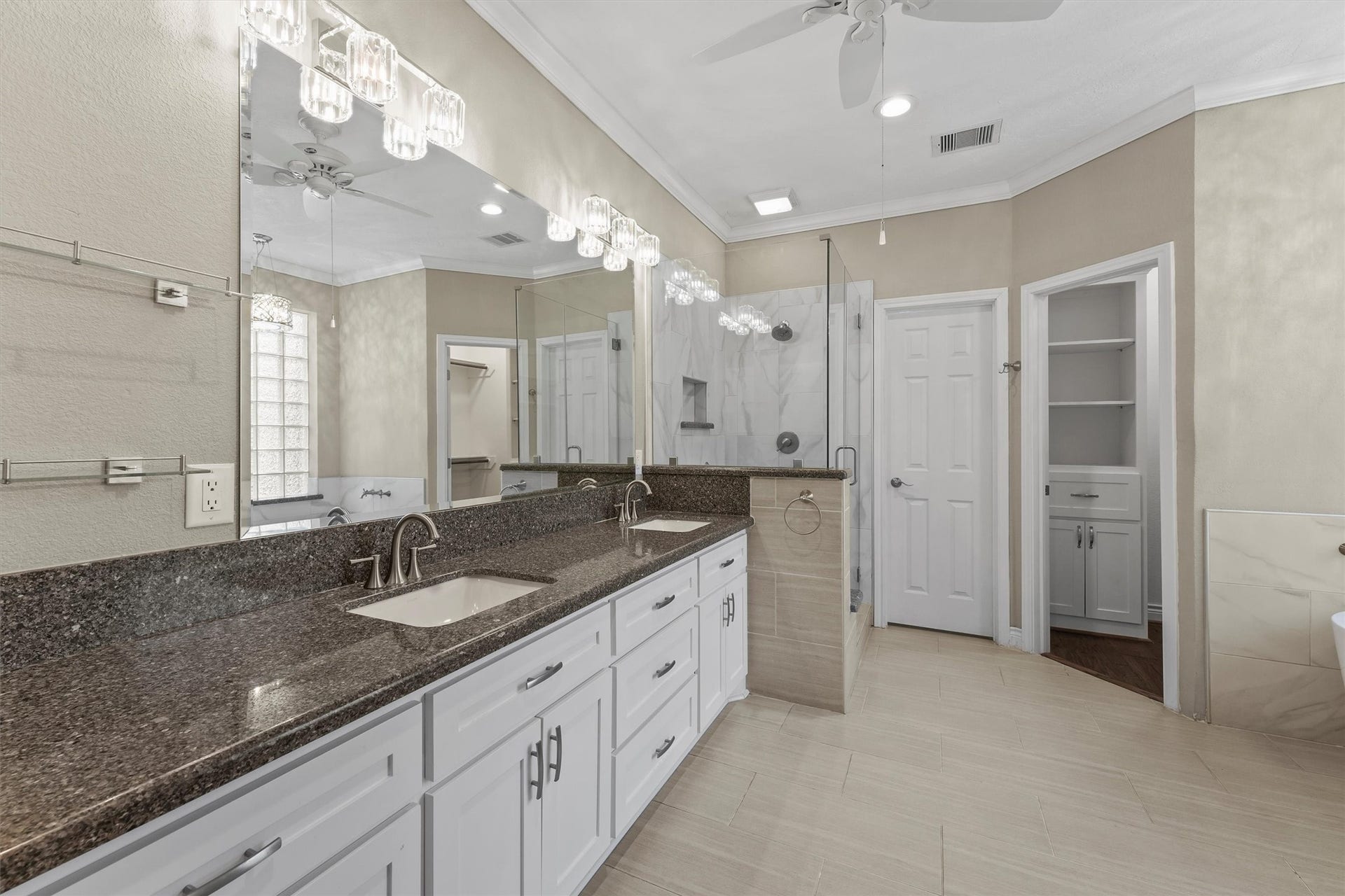 2023 Forest Garden Drive, Kingwood, TX 77345 Well-sized primary suite with dual vanities and an opportunity to create a personalized space.