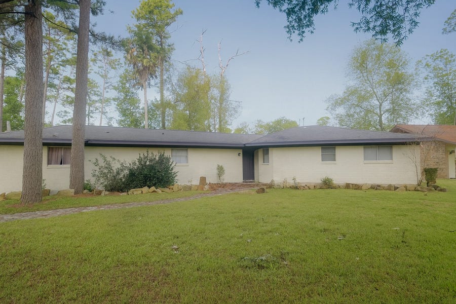 Property photo for 203 Loon River Drive, Huffman, TX