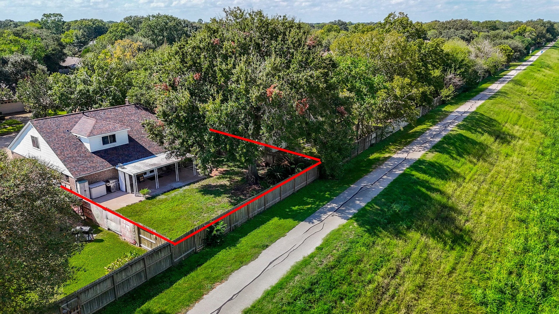 22514 Red River Drive, Katy, TX 77450 Aerial view with subject property outlined in Red.