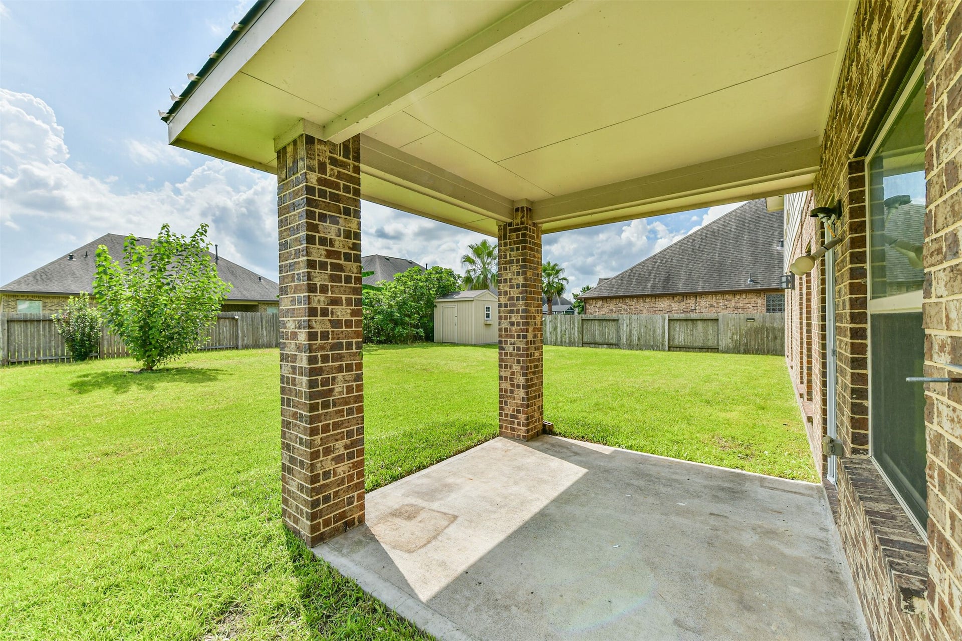 2811 Afton Drive, Pearland, TX 77581 Charming covered patio perfect for relaxing and entertaining.